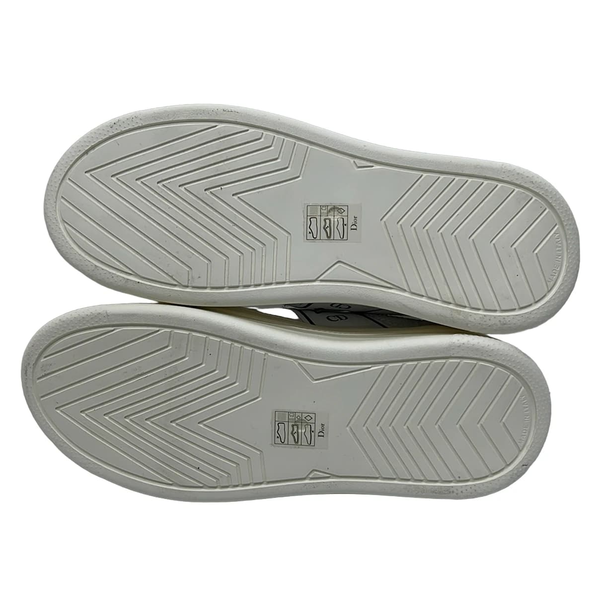 Pair of women's low-top sneakers photographed together.