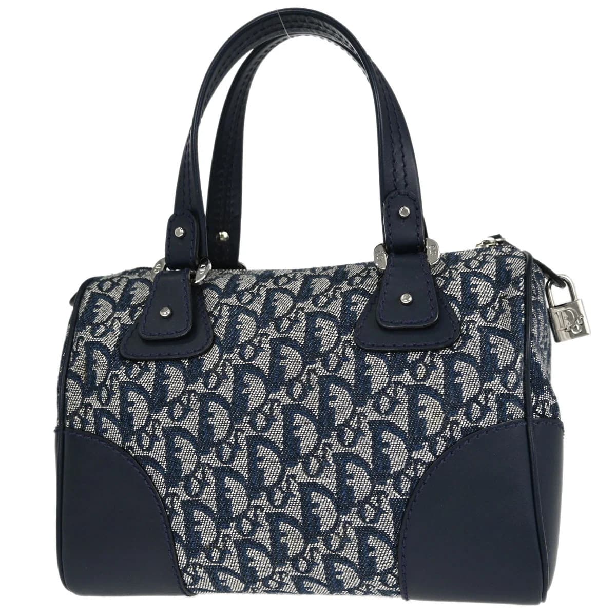 Navy monogram-patterned canvas handbag with leather trim and a small padlock.