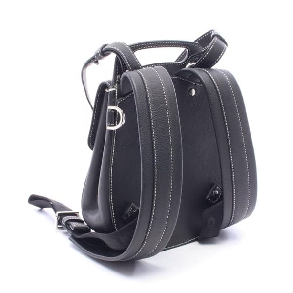 Black backpack with padded straps and a front flap pocket, shown upright.