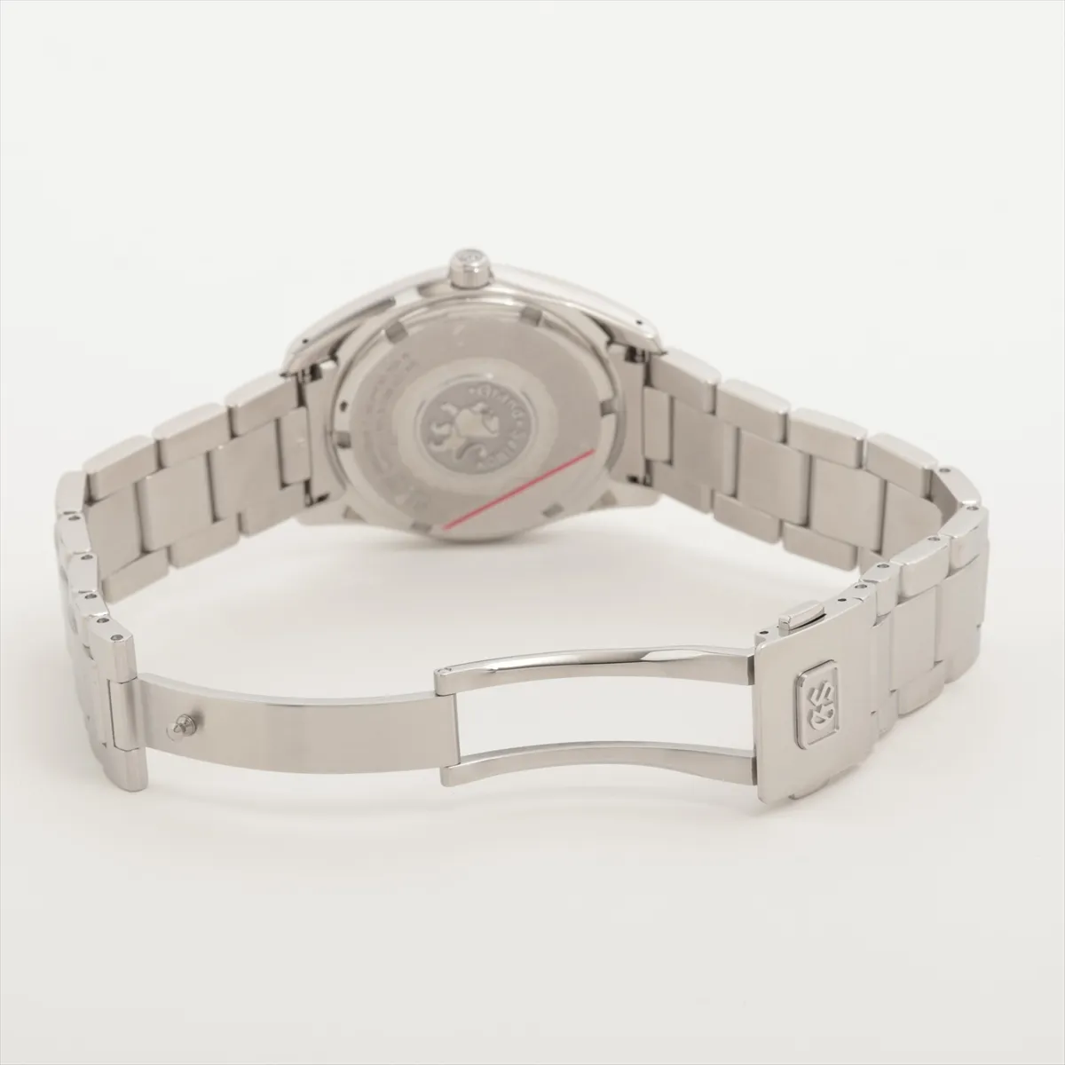 Stainless steel wristwatch with a black dial, polished baton indices and a steel bracelet.