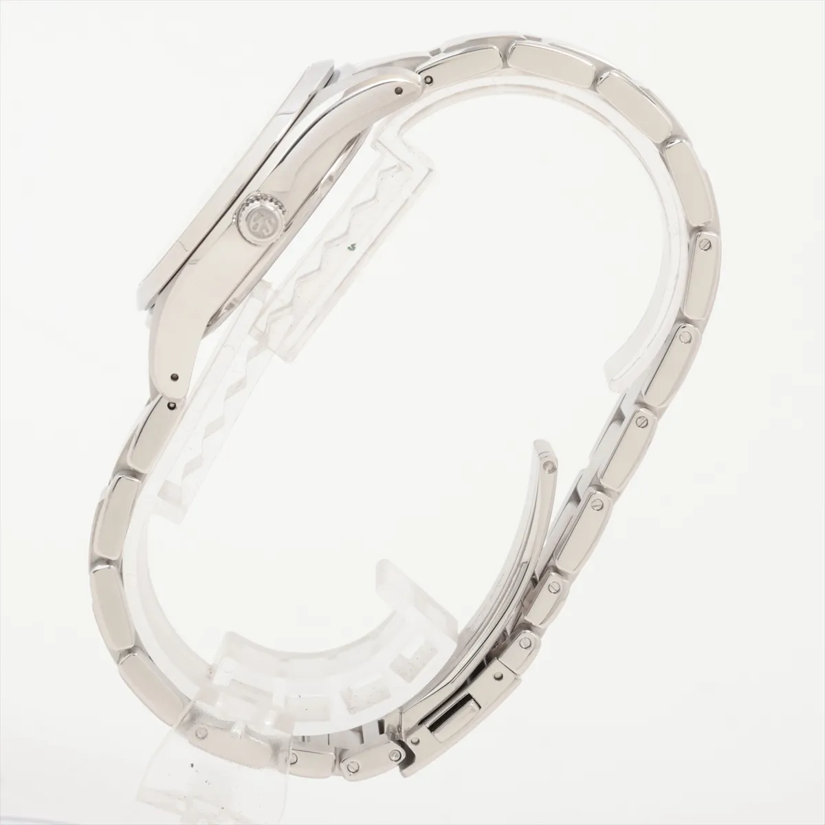 Steel bracelet watch with a black dial, baton markers and a date window at three o'clock.