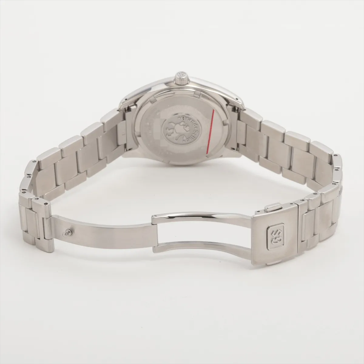 Steel wristwatch with black dial, baton markers and matching steel bracelet.