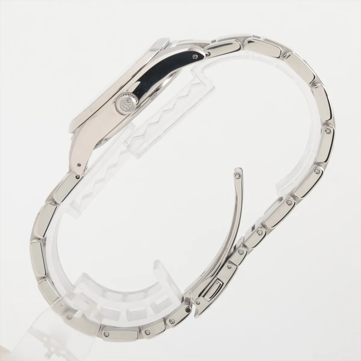 Steel wristwatch with black dial, baton markers and matching steel bracelet.