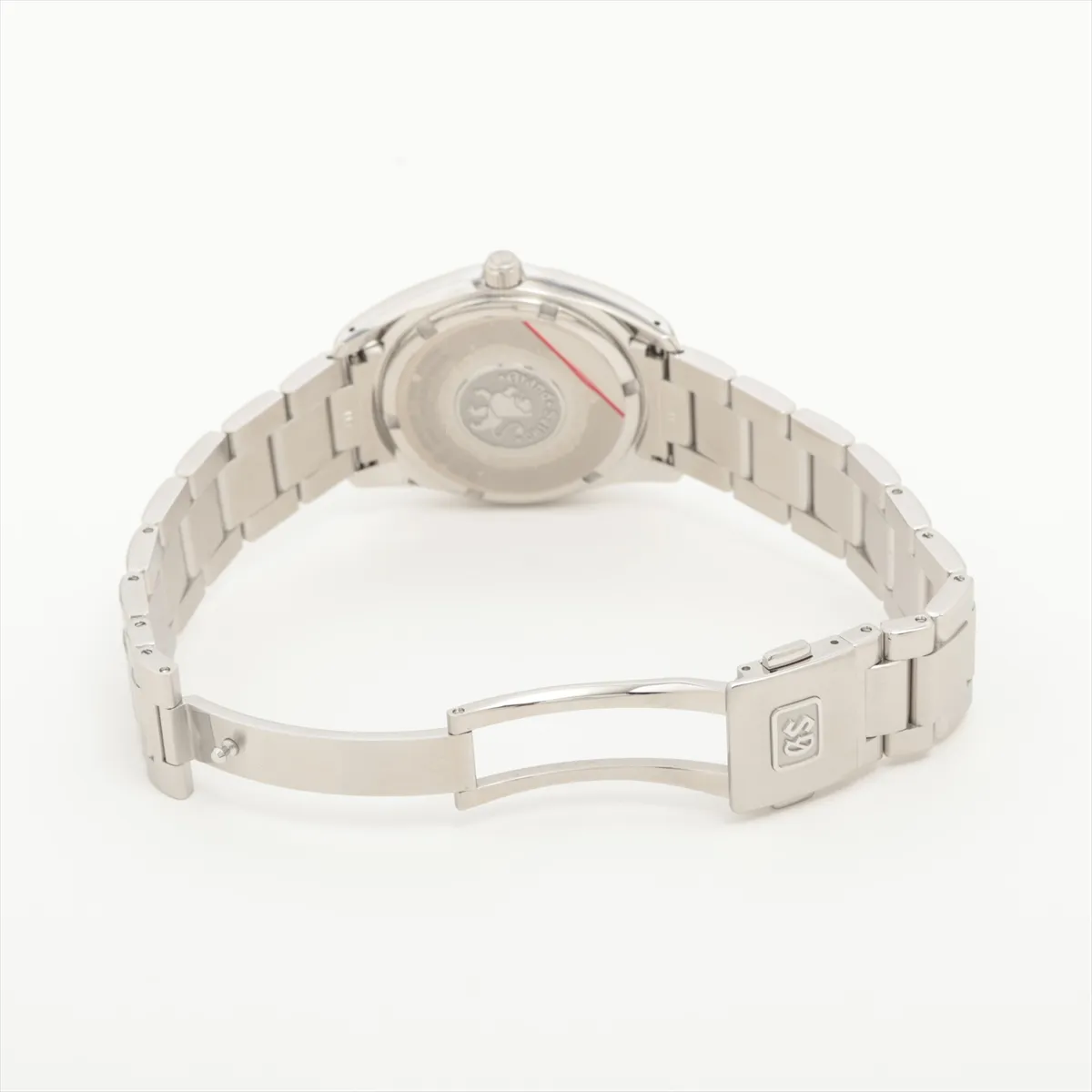 Stainless steel wristwatch with a silver dial, baton markers and a date window at three o'clock.