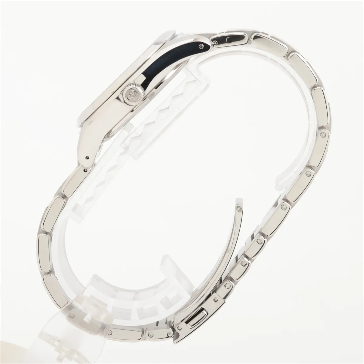 Steel watch with silver dial, applied markers and date window on a matching bracelet.