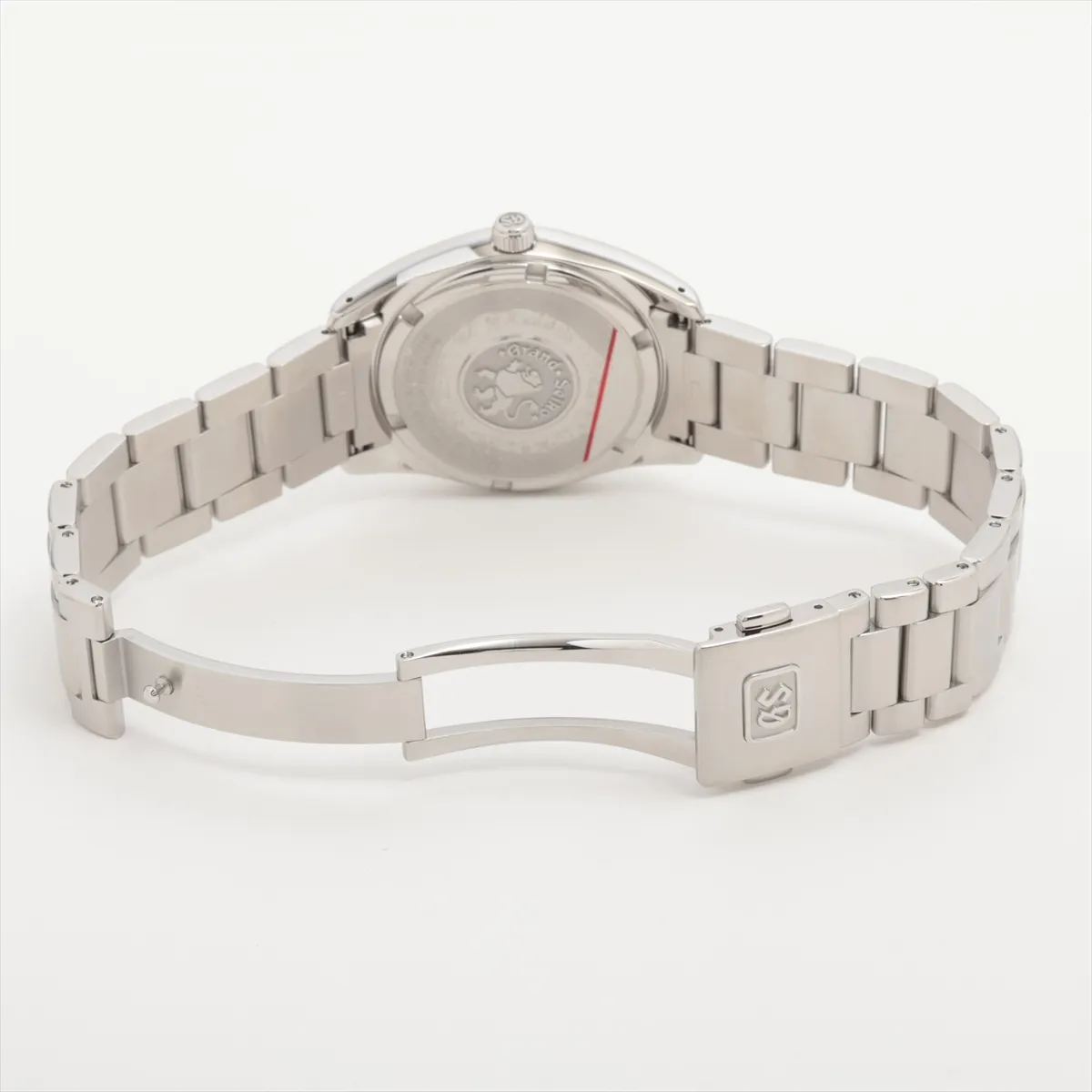 Steel watch with silver dial, applied markers and date window on a matching bracelet.
