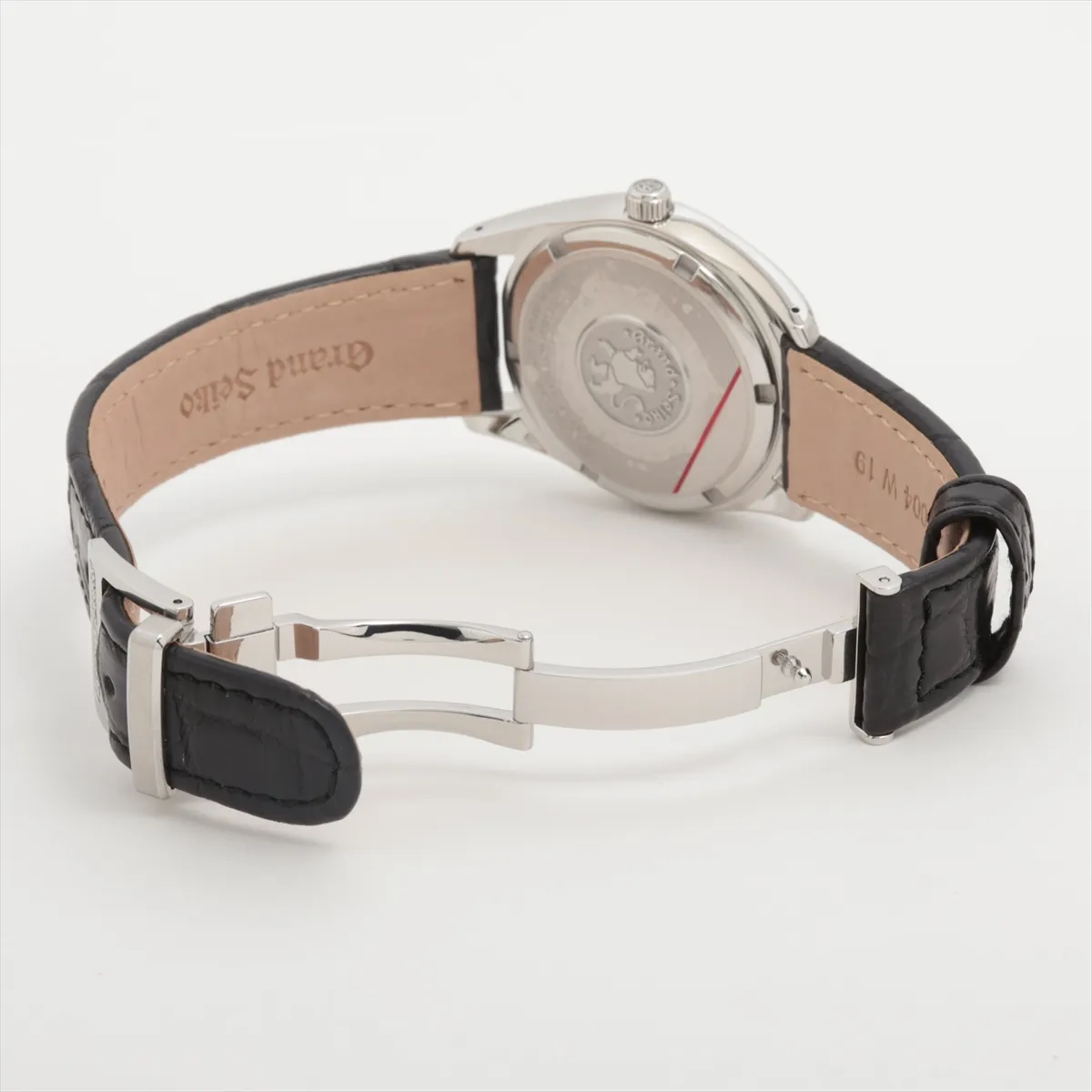 Product photograph of a round silver-dial watch on a leather strap.