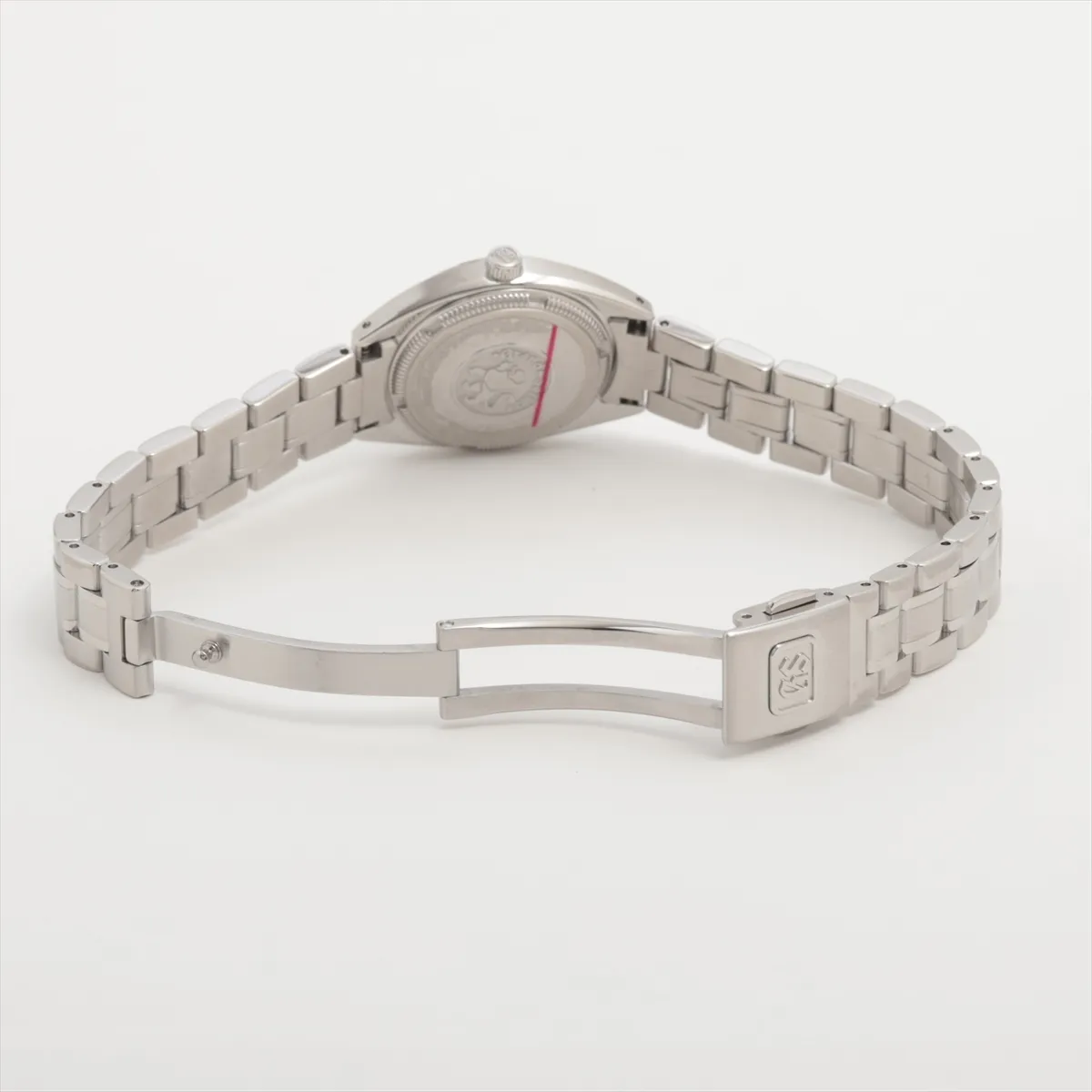 Slim steel watch with shimmering white dial and polished bracelet.