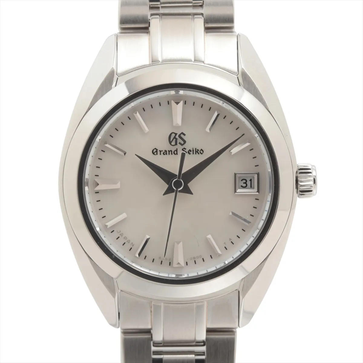 Slim steel watch with shimmering white dial and polished bracelet.
