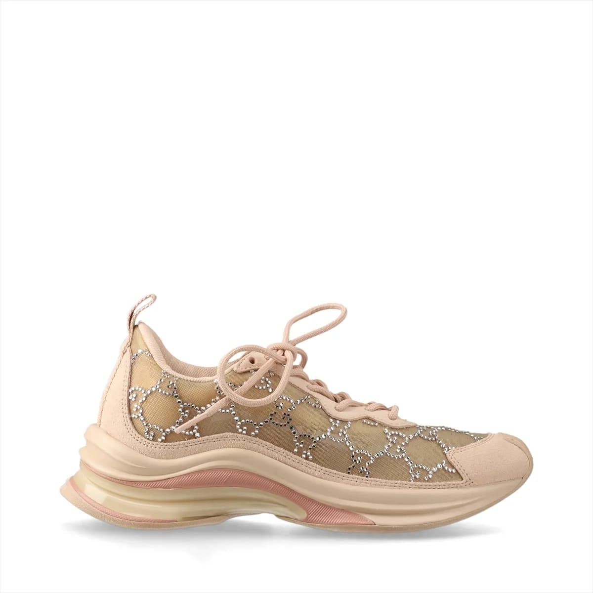 Low-top pink-beige suede and mesh trainers with sparkling stone detailing on the side.