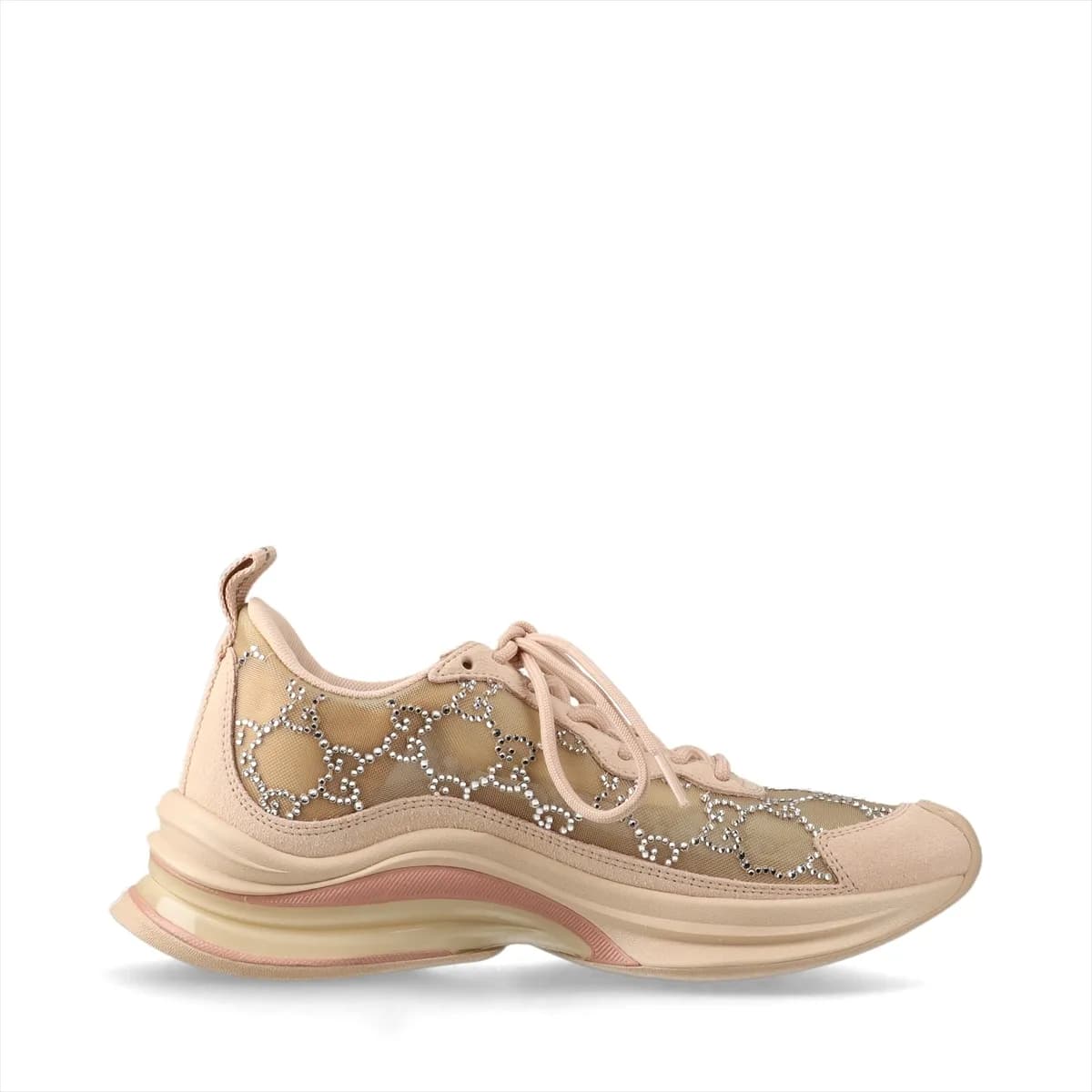 Low-top pink-beige suede and mesh trainers with sparkling stone detailing on the side.