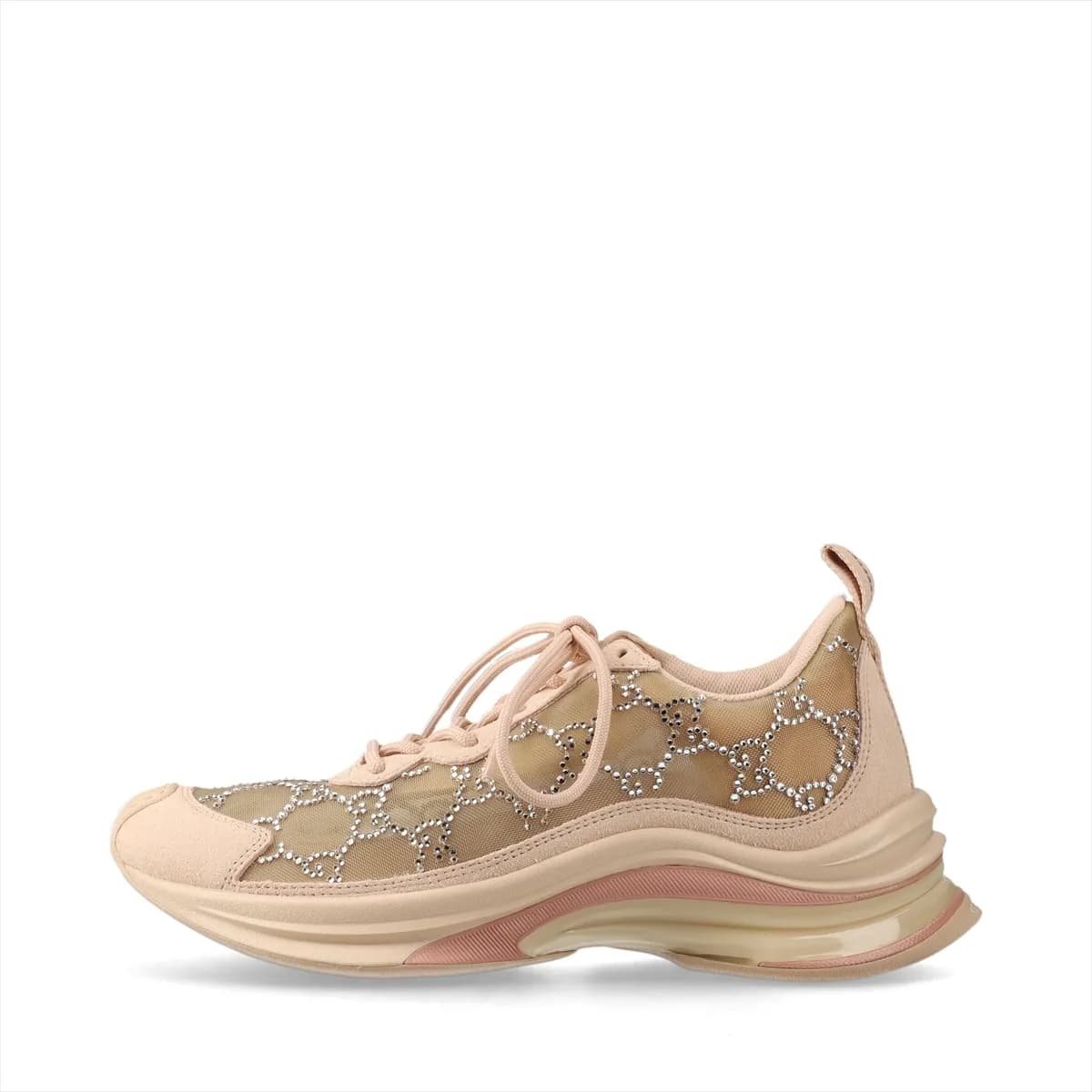 Low-top pink-beige suede and mesh trainers with sparkling stone detailing on the side.