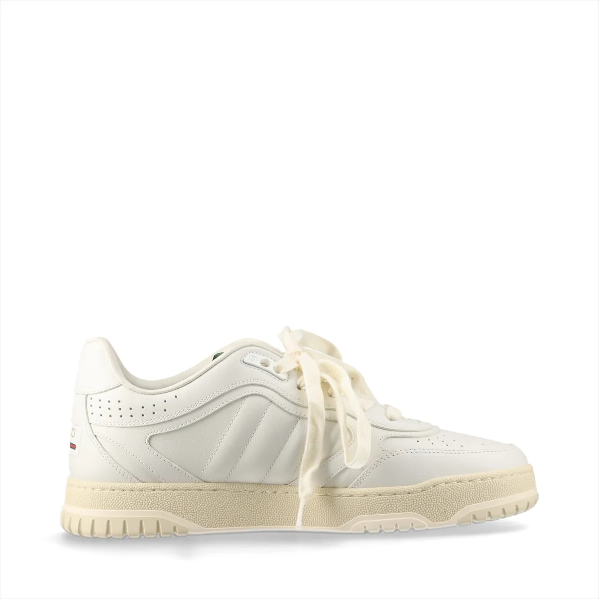 Pair of white low-top leather sneakers with a green and red stripe and a metal logo detail at the side, shown on a plain background.