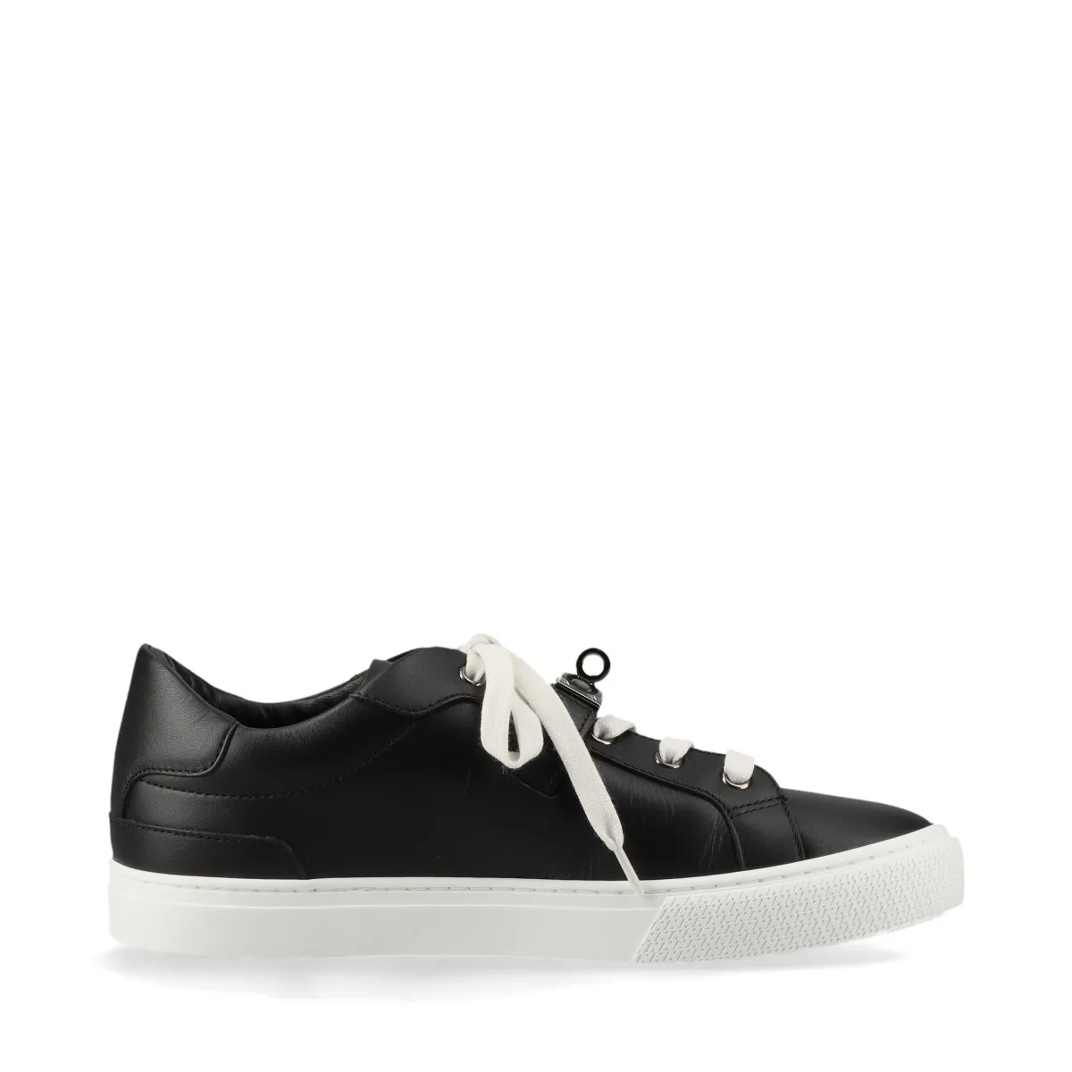 Black leather low-top sneakers with a metal turn-lock detail on the side.