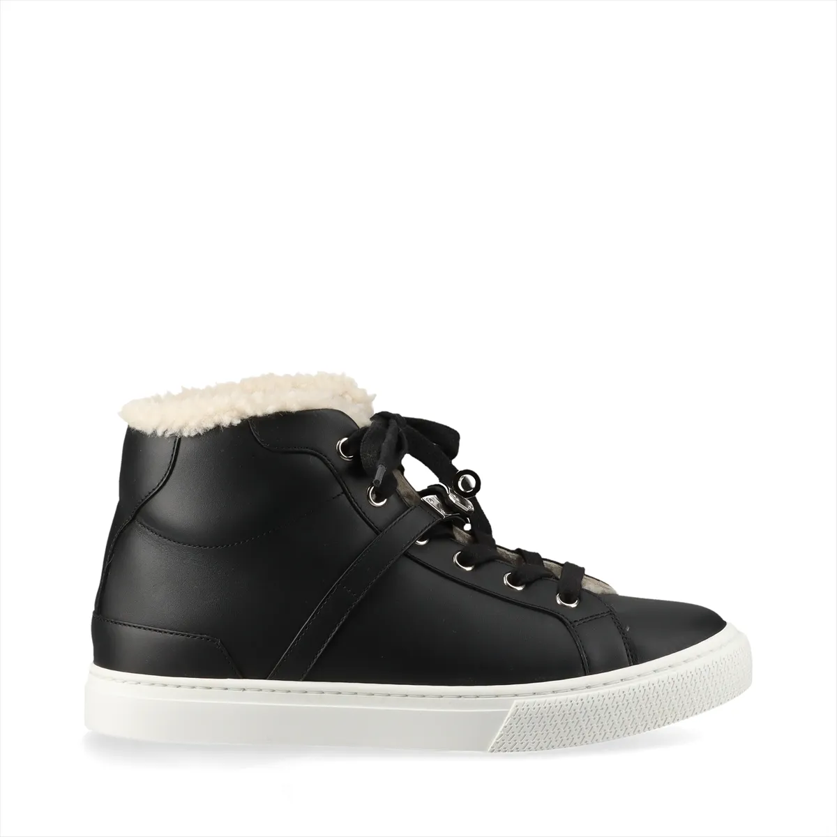 Black high-top sneakers with fluffy shearling lining and metal buckle hardware