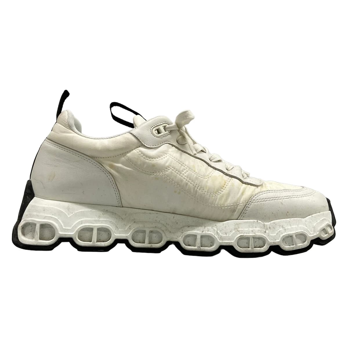 Pair of white leather low-top sneakers.