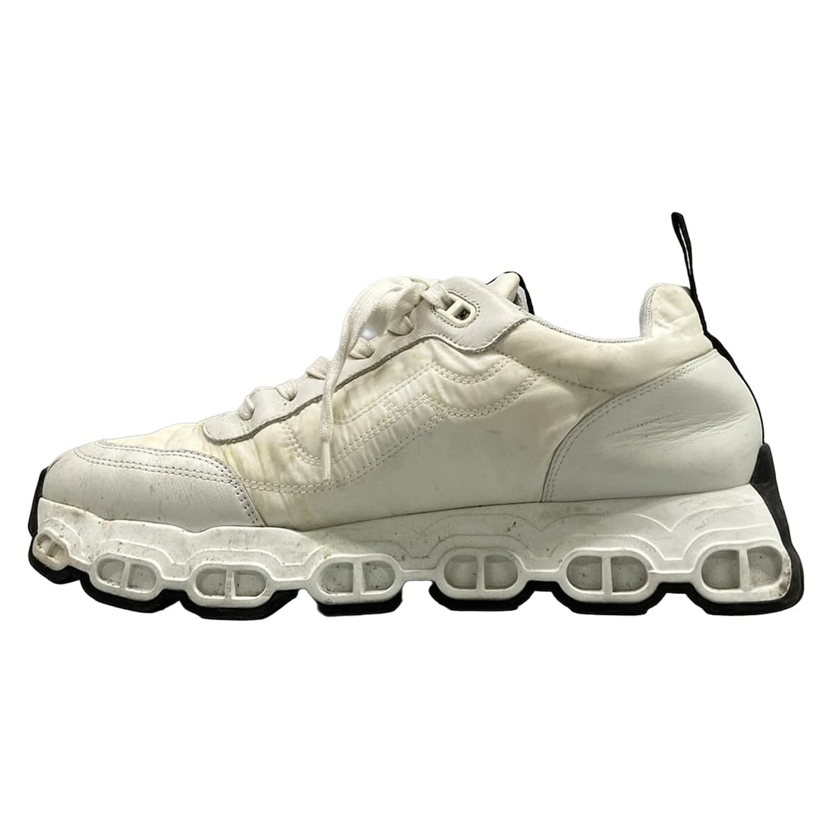 Pair of white leather low-top sneakers.