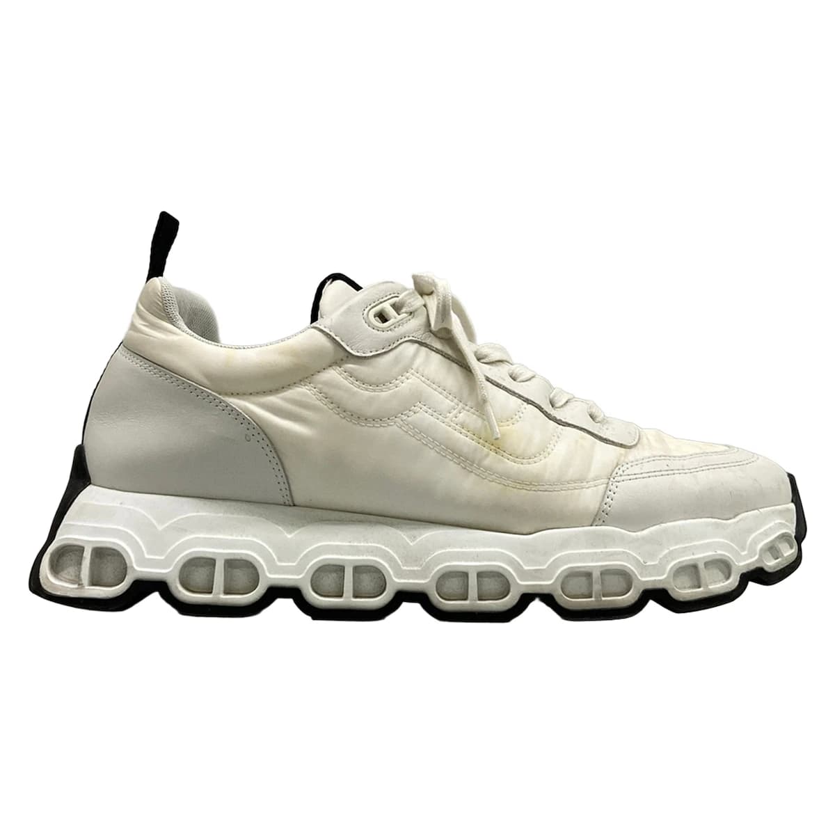 Pair of white leather low-top sneakers.