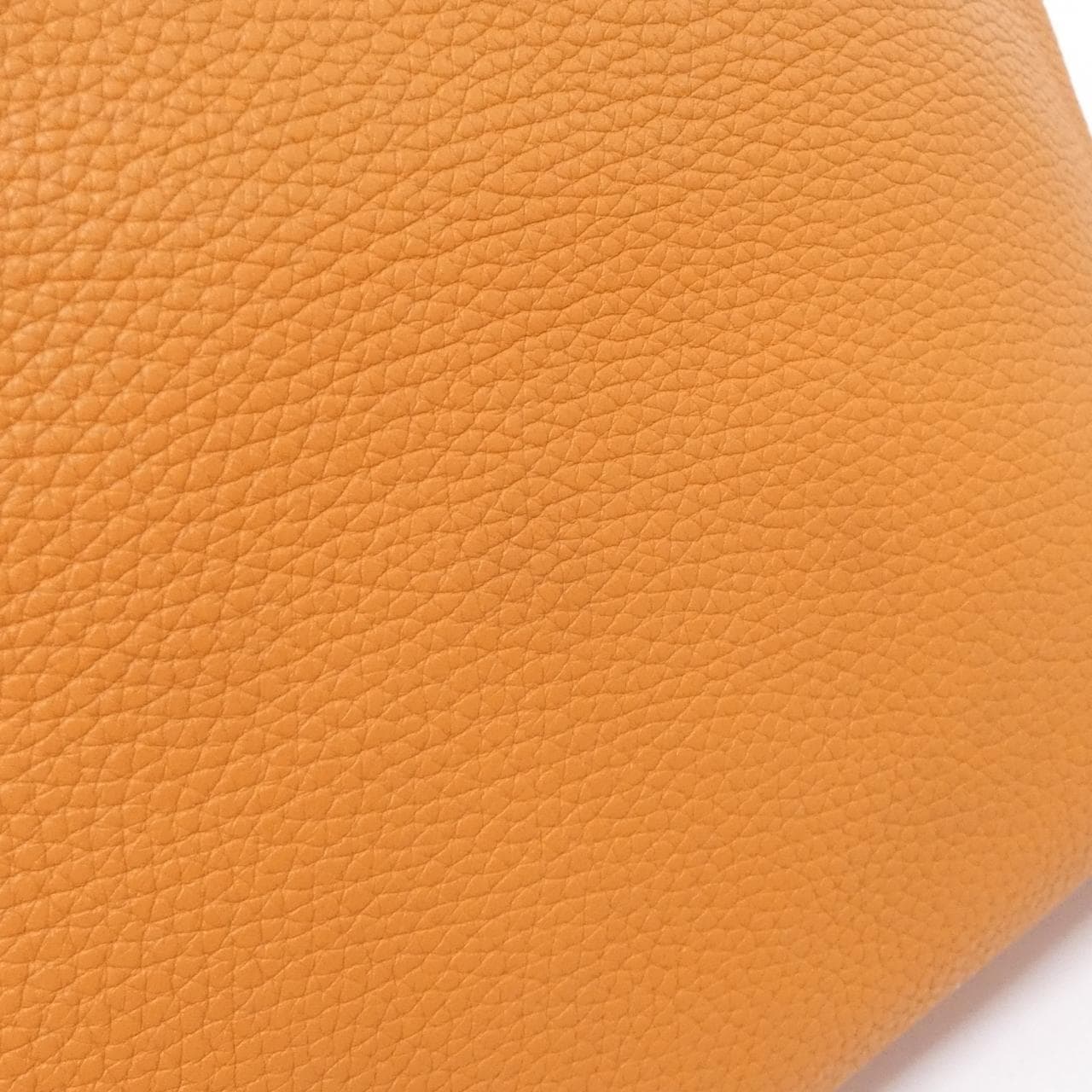 Large open-top leather tote with twin shoulder straps and contrasting interior.