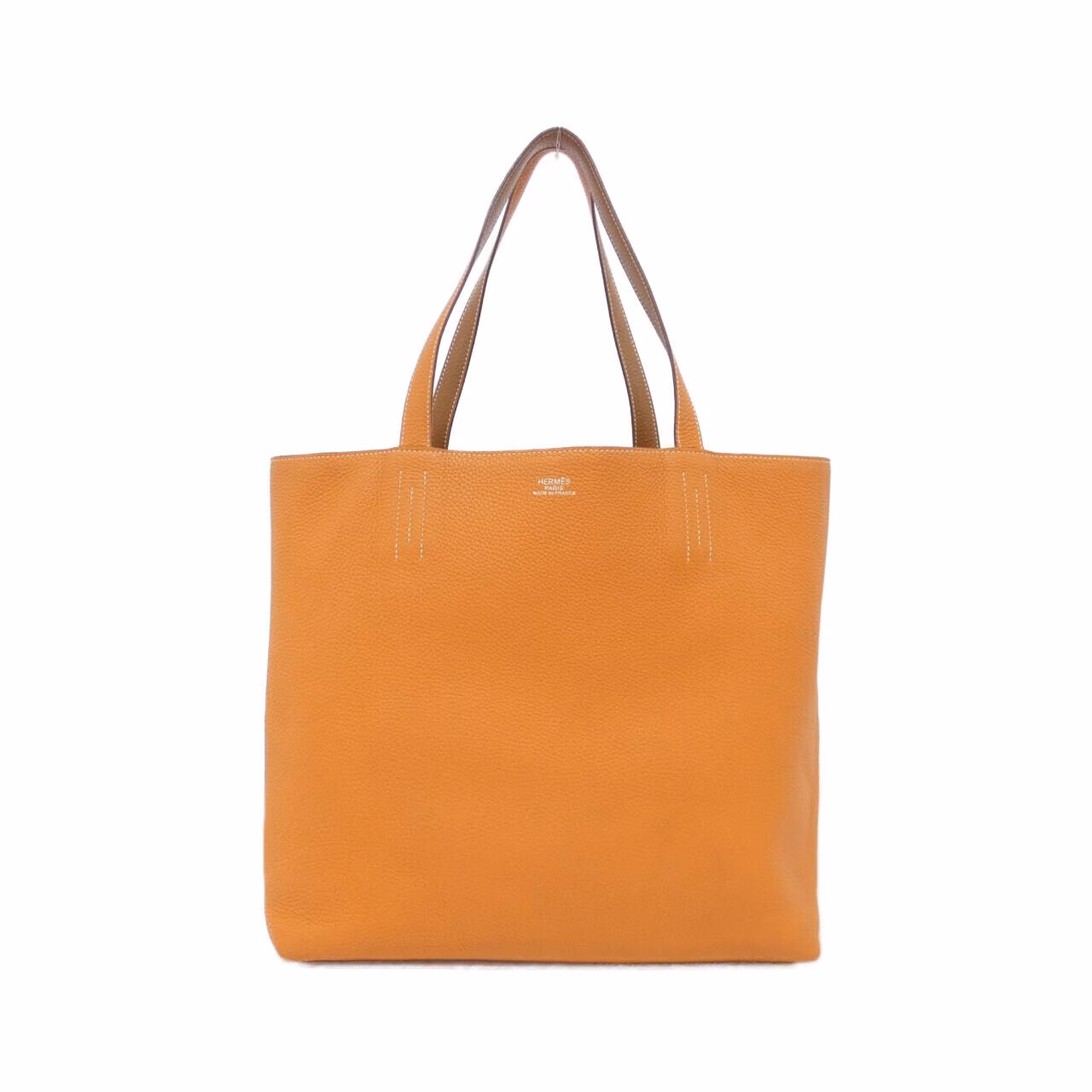 Large open-top leather tote with twin shoulder straps and contrasting interior.