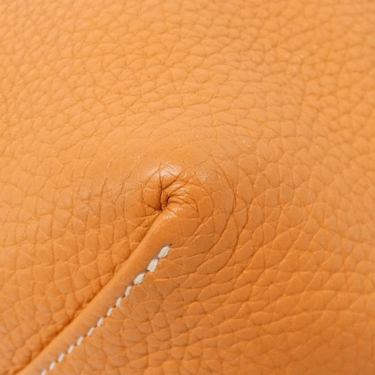 Large open-top leather tote with twin shoulder straps and contrasting interior.