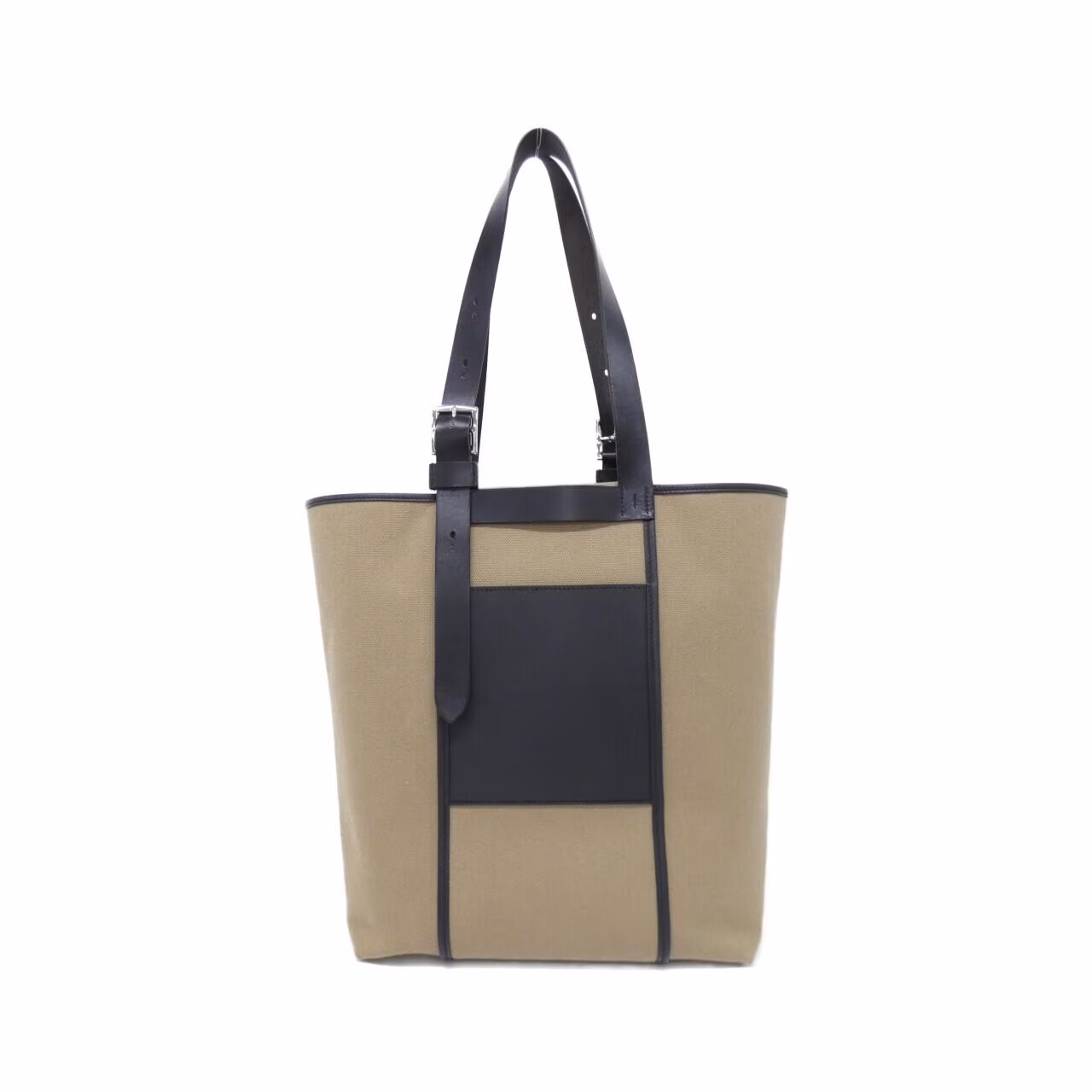 Structured brown bag with a front flap pocket and a flat top handle.
