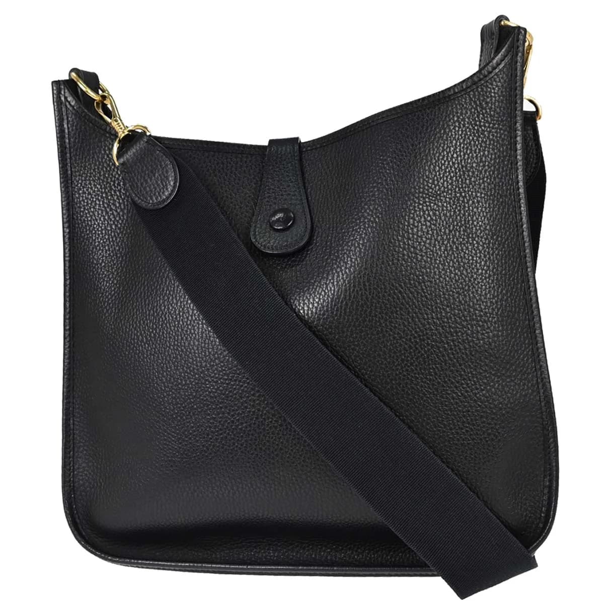 Black grained leather shoulder bag with a perforated H on the front and a long strap.