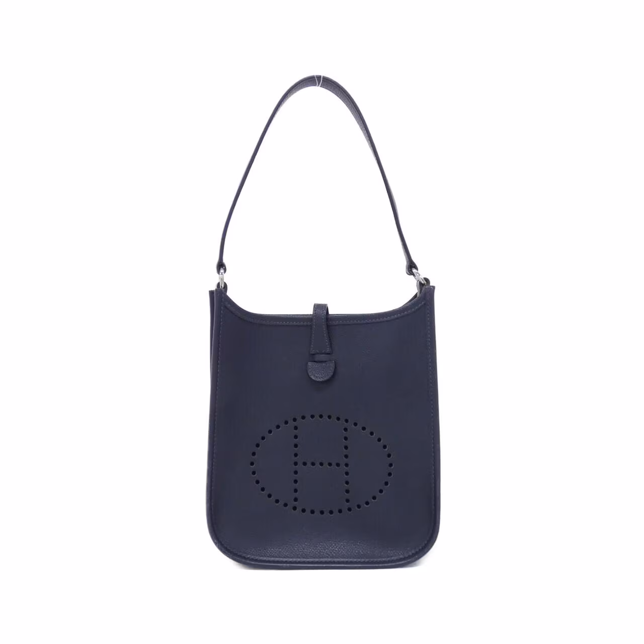 Small leather shoulder bag with perforated H cut-out on the front panel and a long flat strap