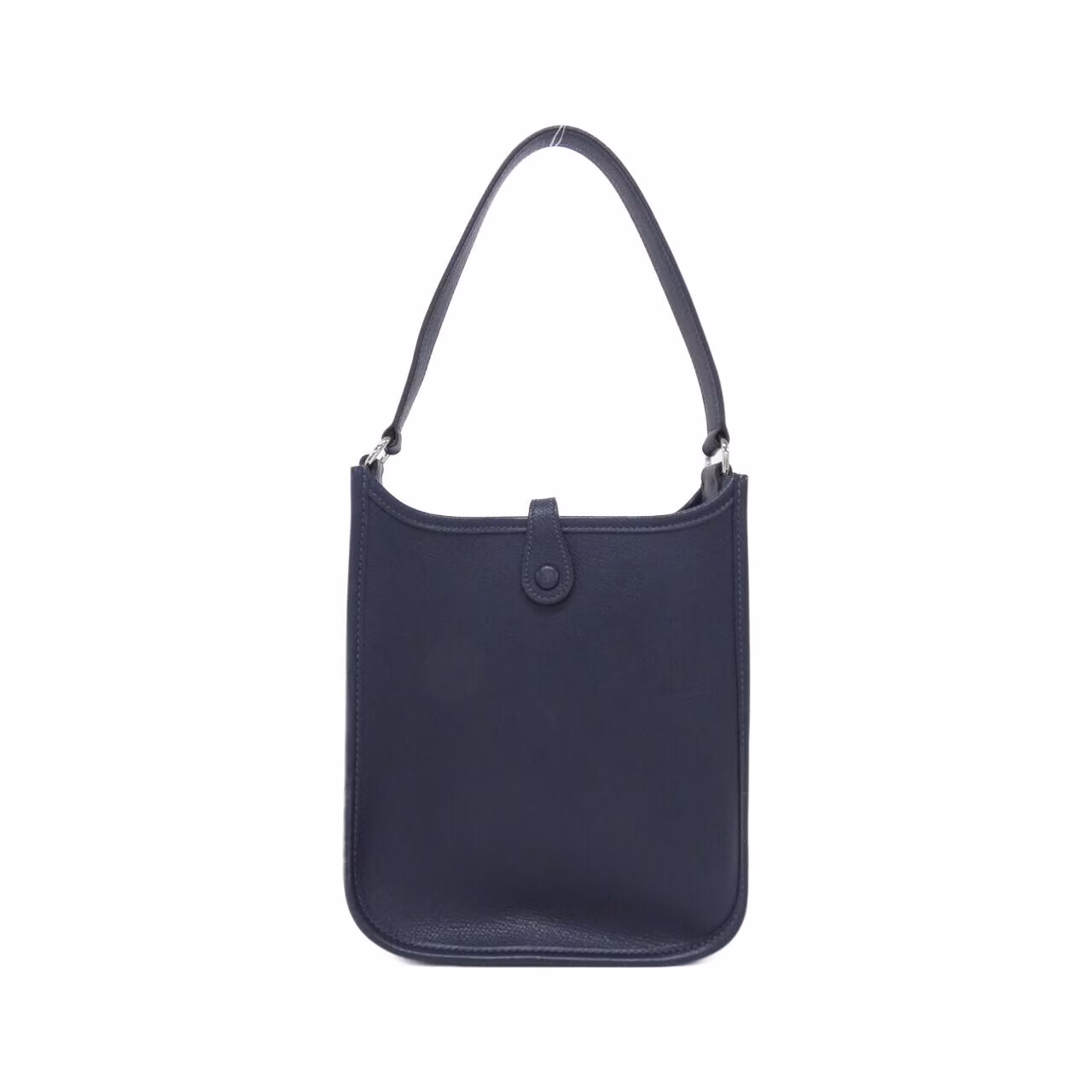 Small leather shoulder bag with perforated H cut-out on the front panel and a long flat strap