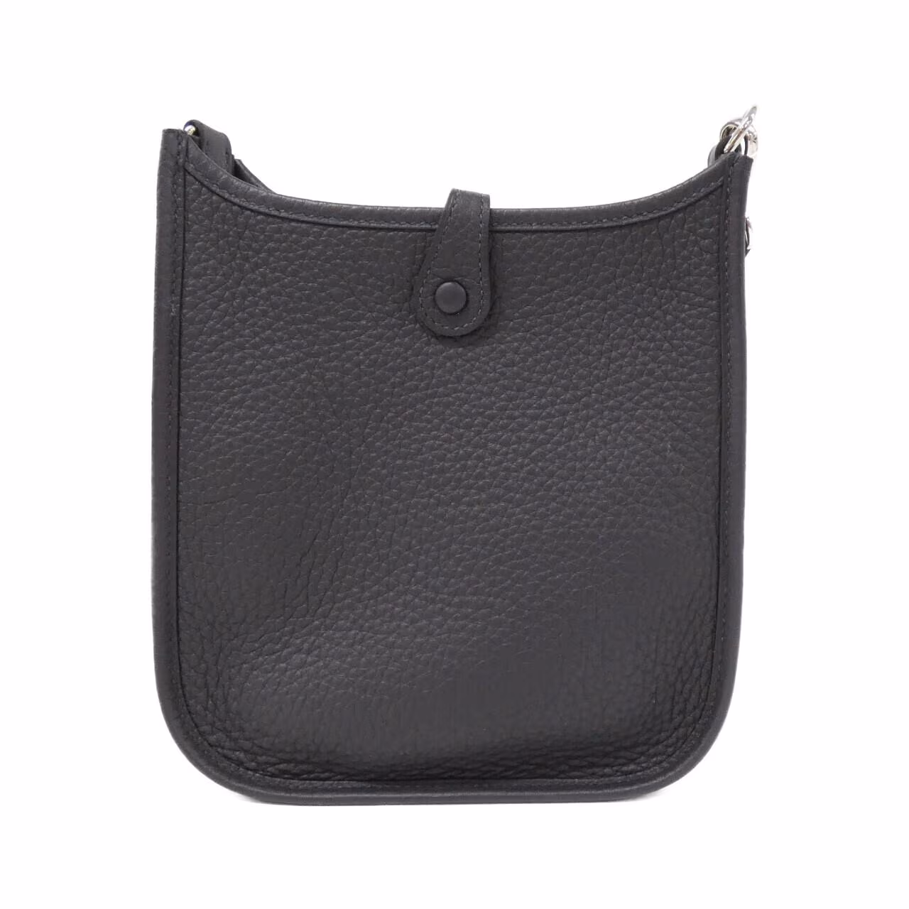 Small leather shoulder bag with perforated H motif on the front and a woven strap.