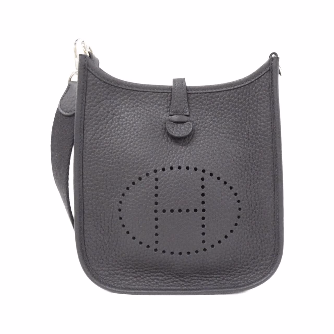 Small leather shoulder bag with perforated H motif on the front and a woven strap.