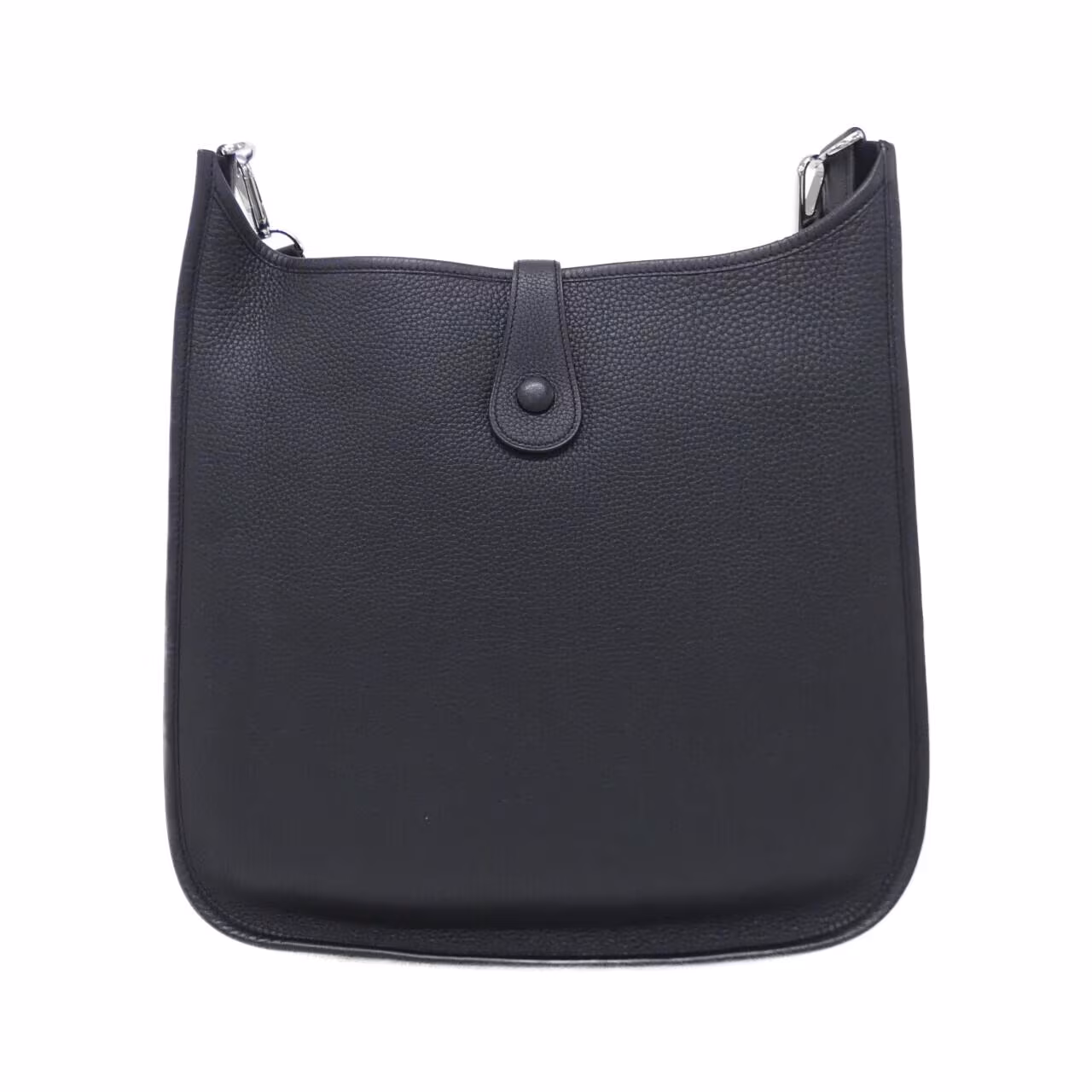 Large leather shoulder bag with perforated H cut-out on the front and a long adjustable strap