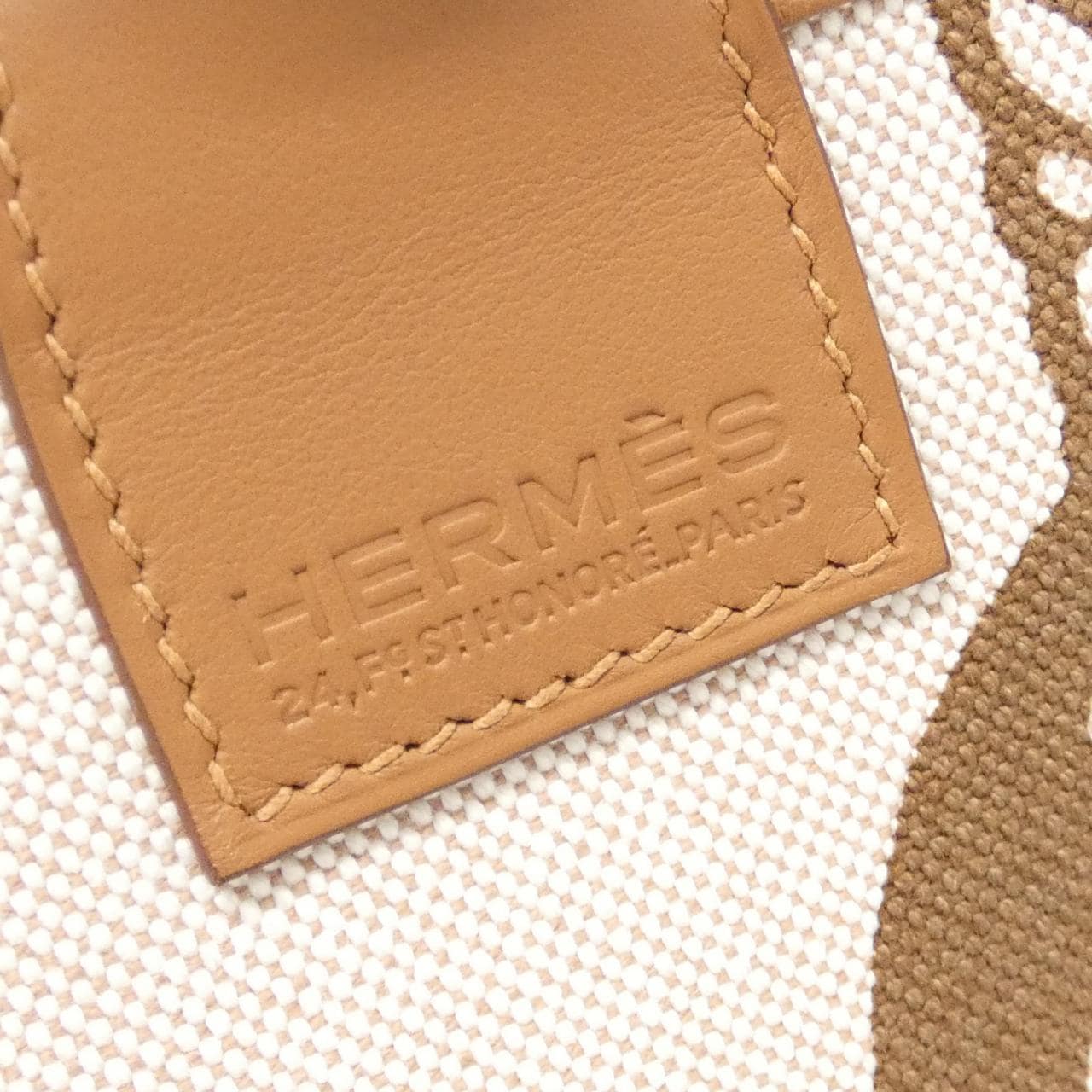 Handbag photographed front-on against a plain background.