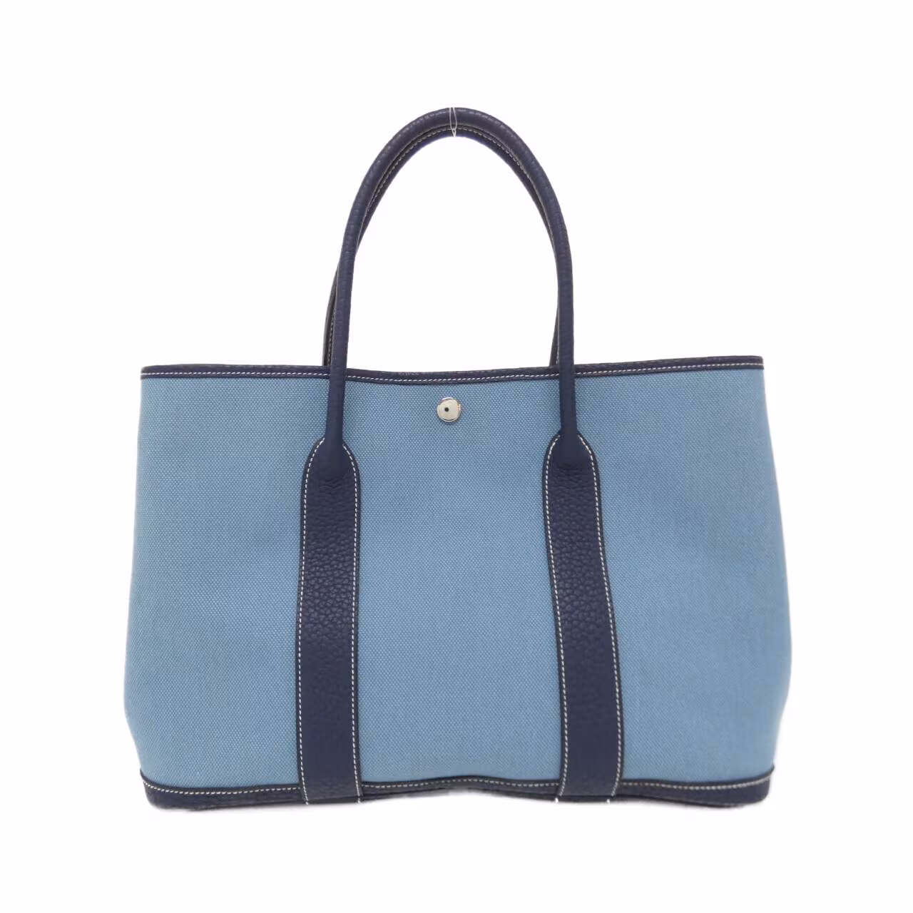 Open-top tote with twin rolled handles shown against a plain background.