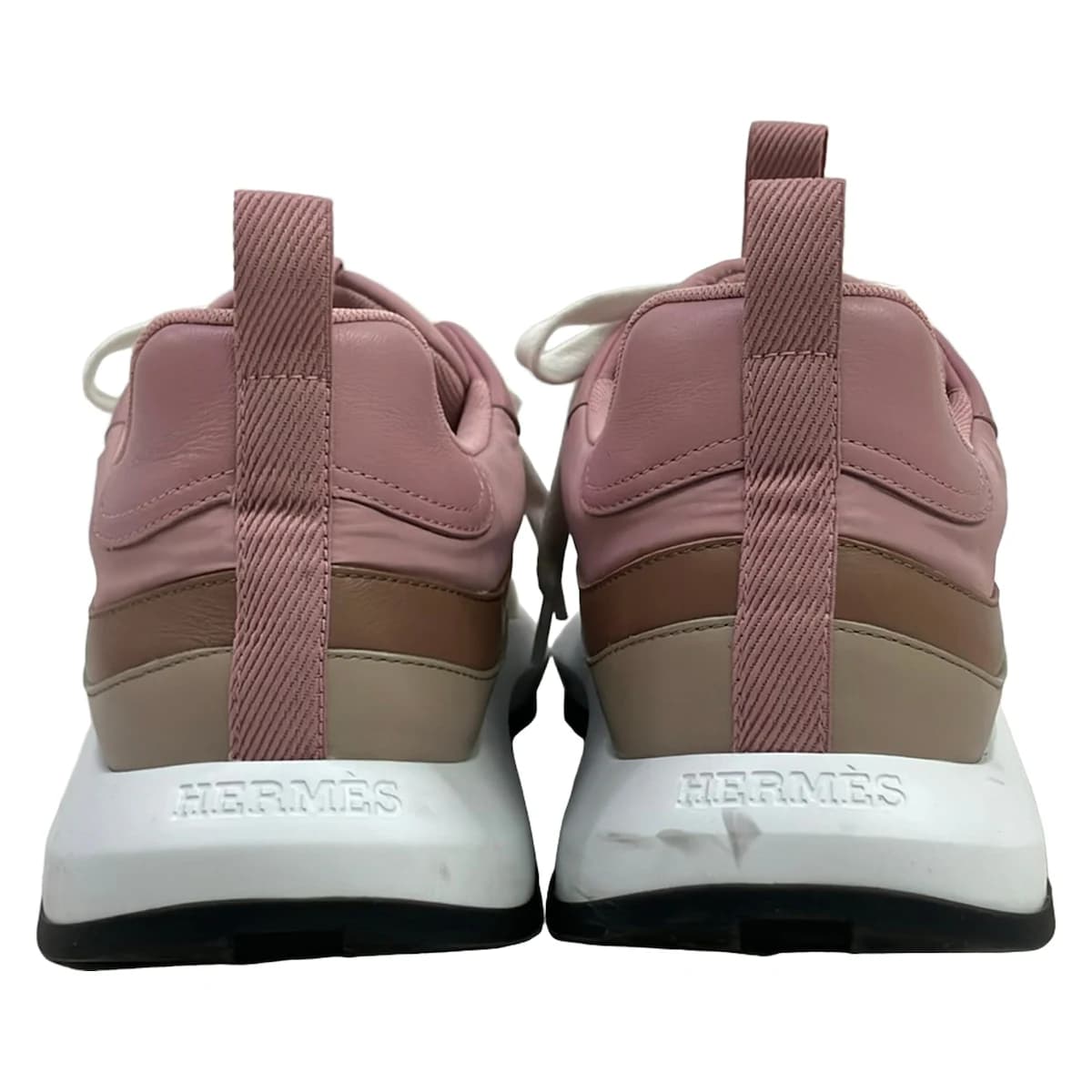 Pair of low-top women's trainers shown side on.