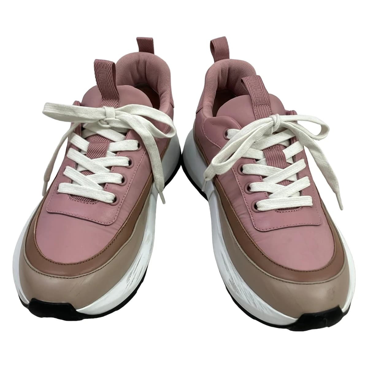 Pair of low-top women's trainers shown side on.