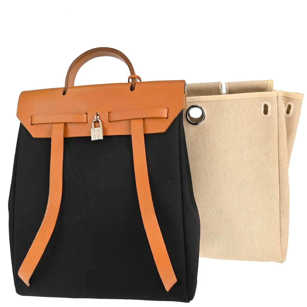 Canvas backpack with beige body, black leather trim and flap closure with straps.