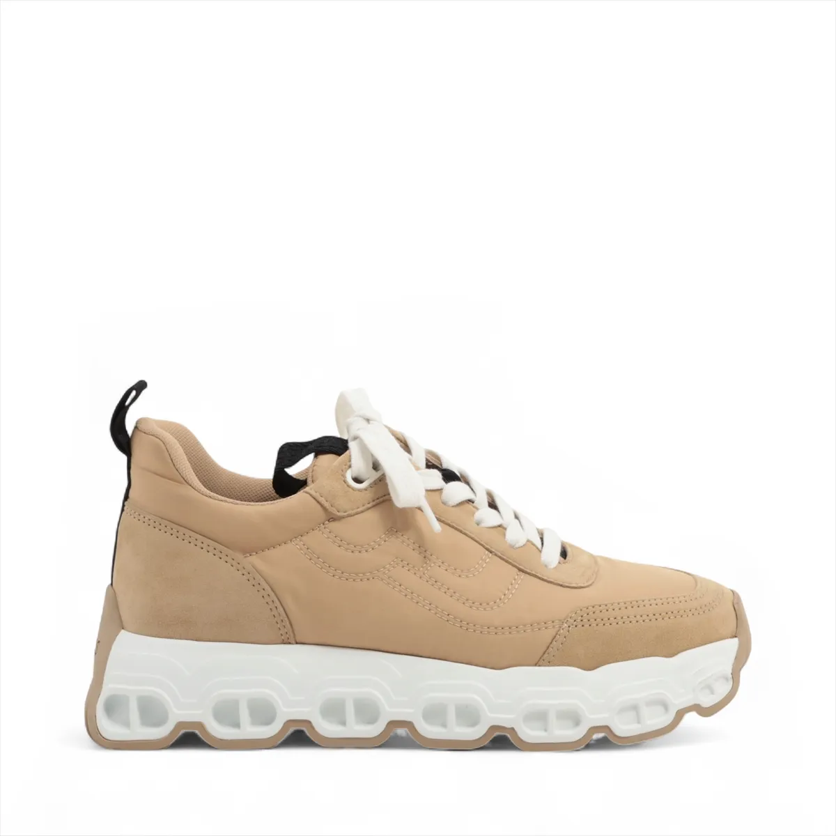 Beige suede and fabric trainer with a chunky white platform sole and chain-link motif