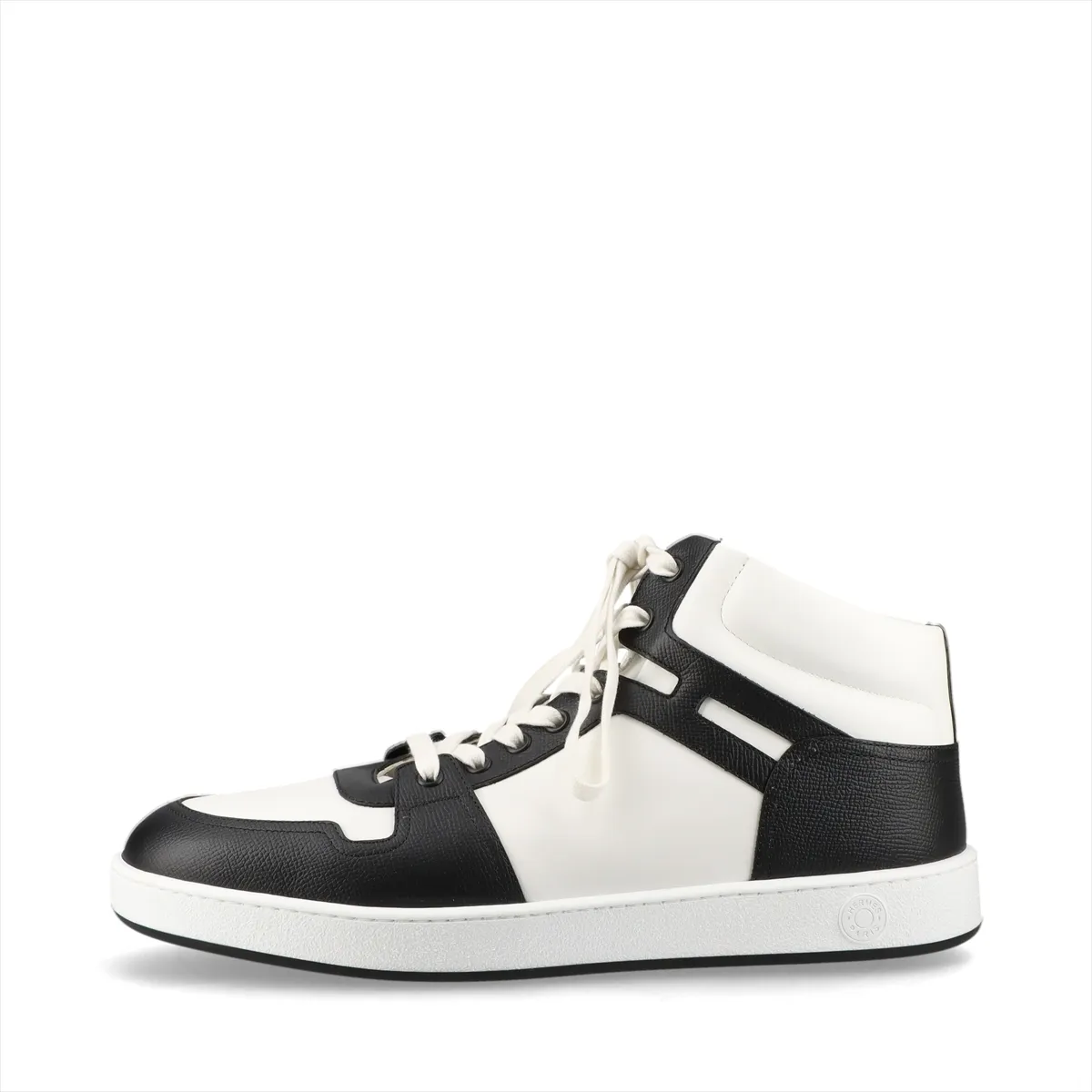 Black leather high-top sneaker with white sole and contrasting white detailing.