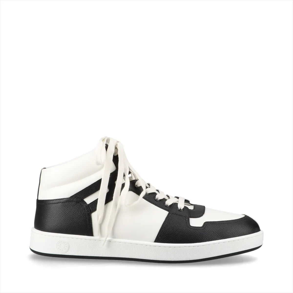 Black leather high-top sneaker with white sole and contrasting white detailing.