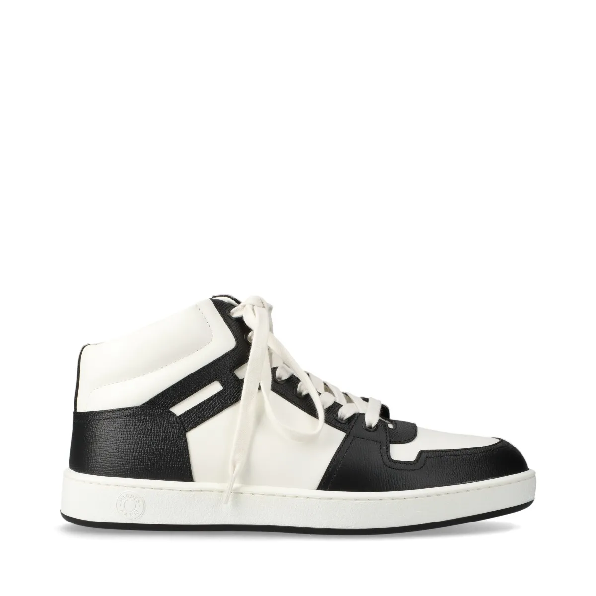 Pair of black leather high-top lace-up shoes with white soles and white trim, shown in profile.