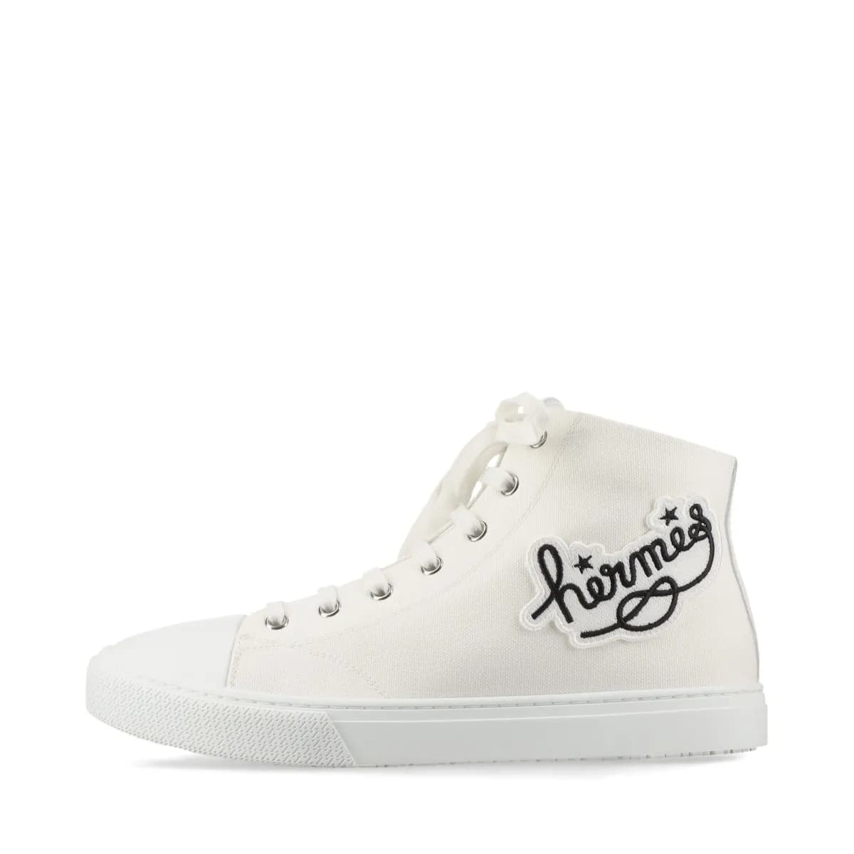 Pair of white canvas and leather high-top sneakers with a logo patch