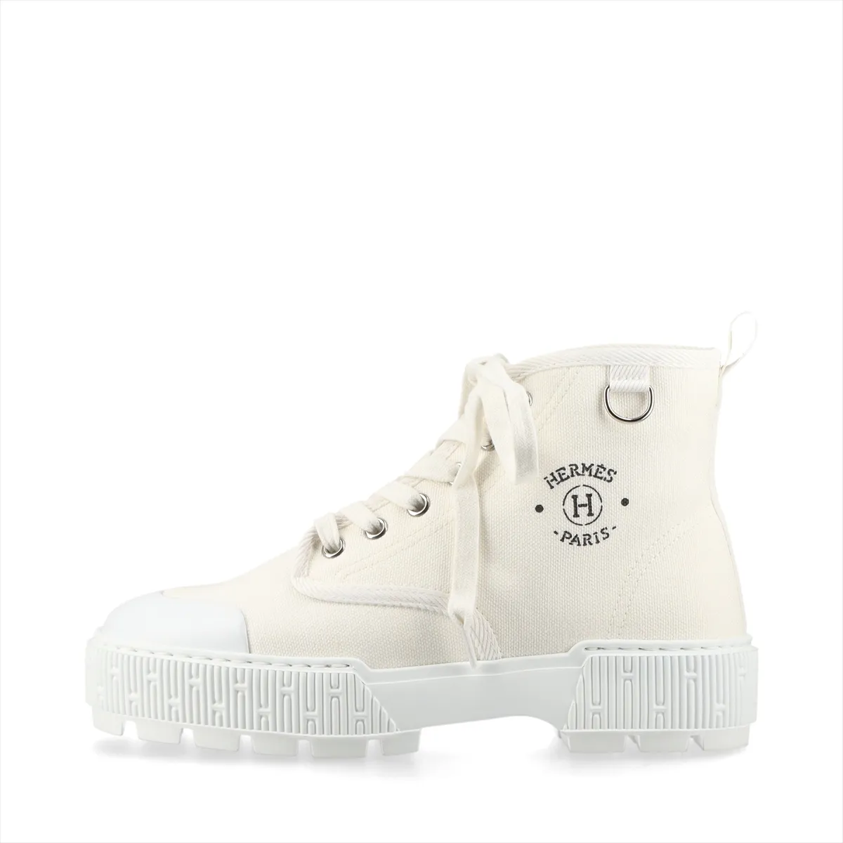 White high-top sneaker with canvas upper, leather trim and white rubber sole.