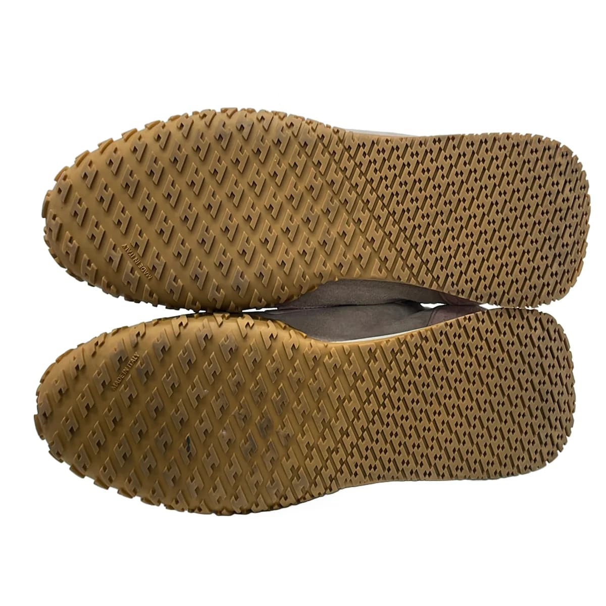 Pair of low-top lace-up shoes photographed side on against a plain background.