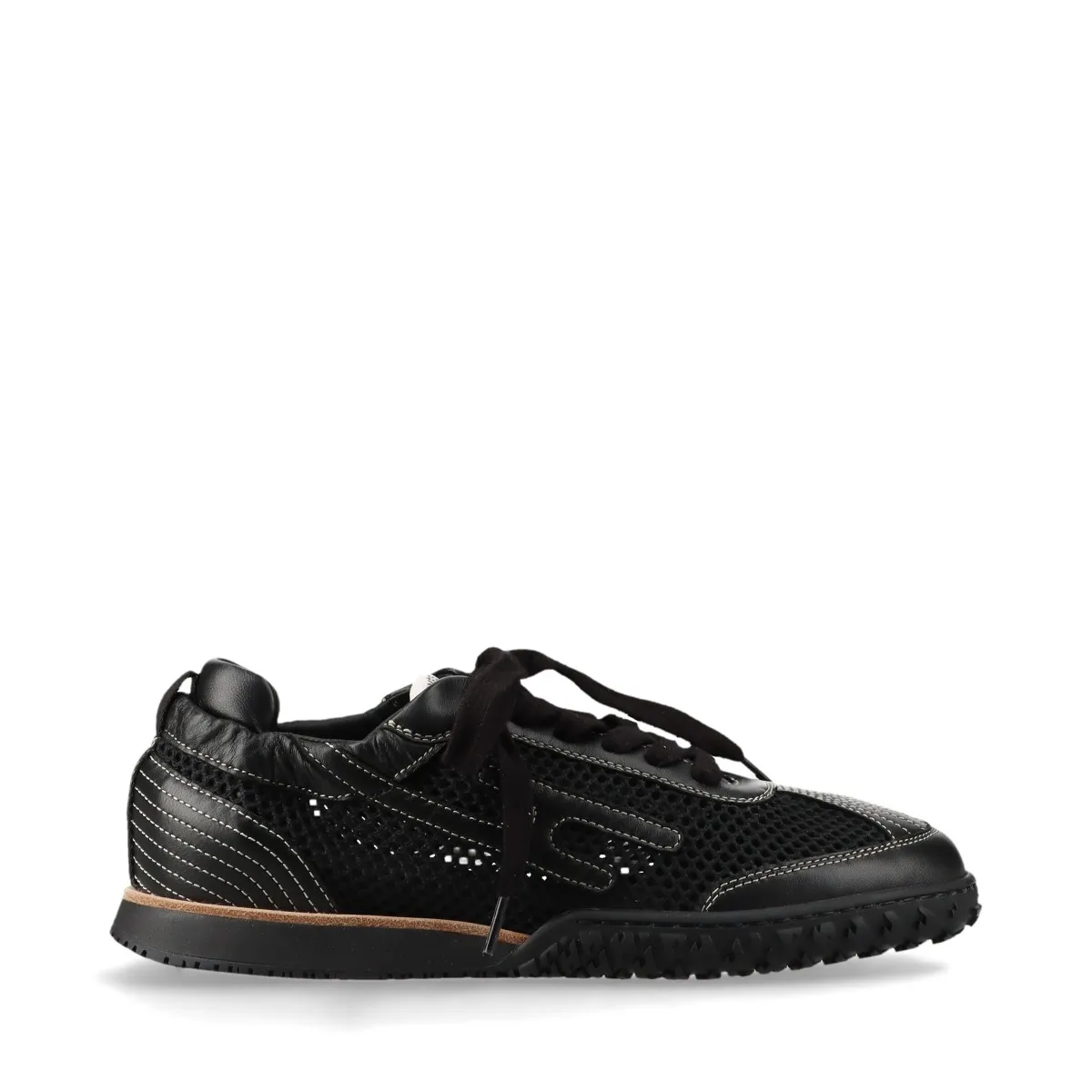 Black low-top sneakers with mesh panels and white soles.