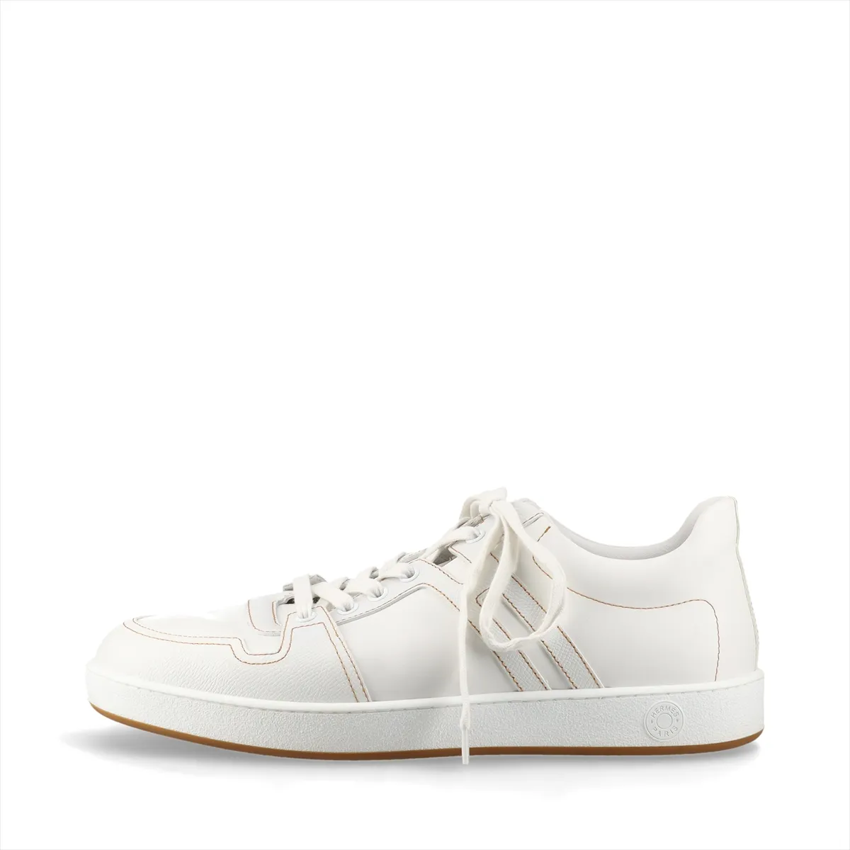 White leather low-top footwear with brown trim and contrast stitching at the side panel