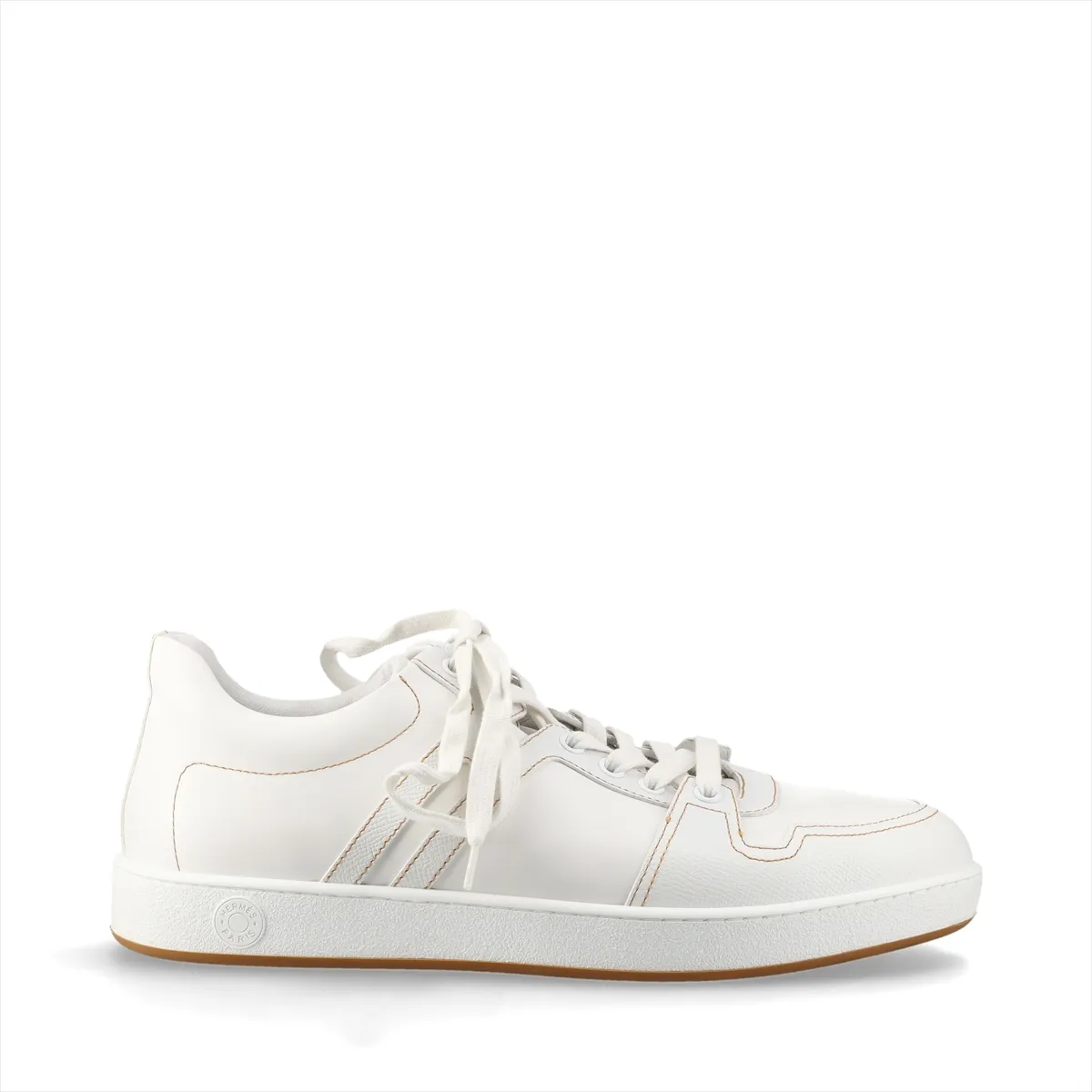 White leather low-top footwear with brown trim and contrast stitching at the side panel