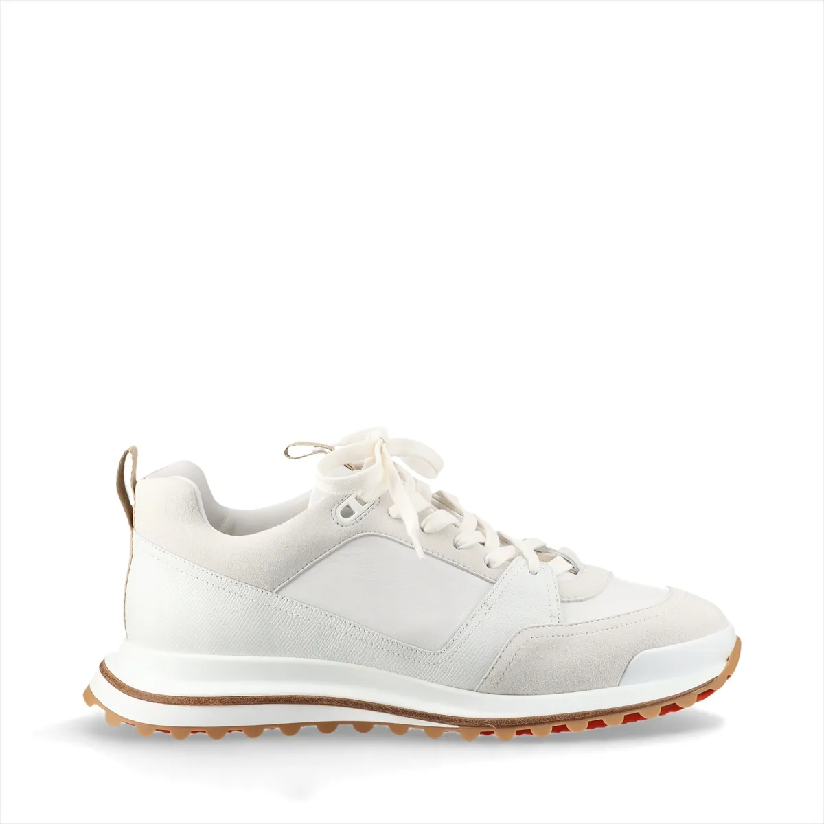 White leather low-top footwear with grey panelling, photographed from the side