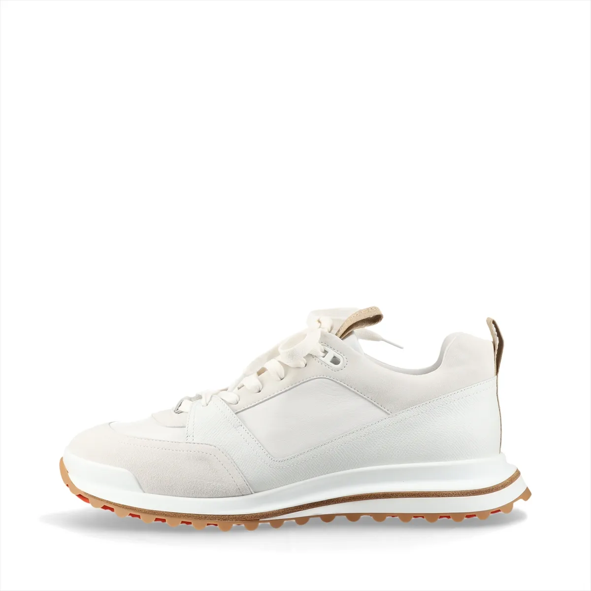 White leather low-top footwear with grey panelling, photographed from the side