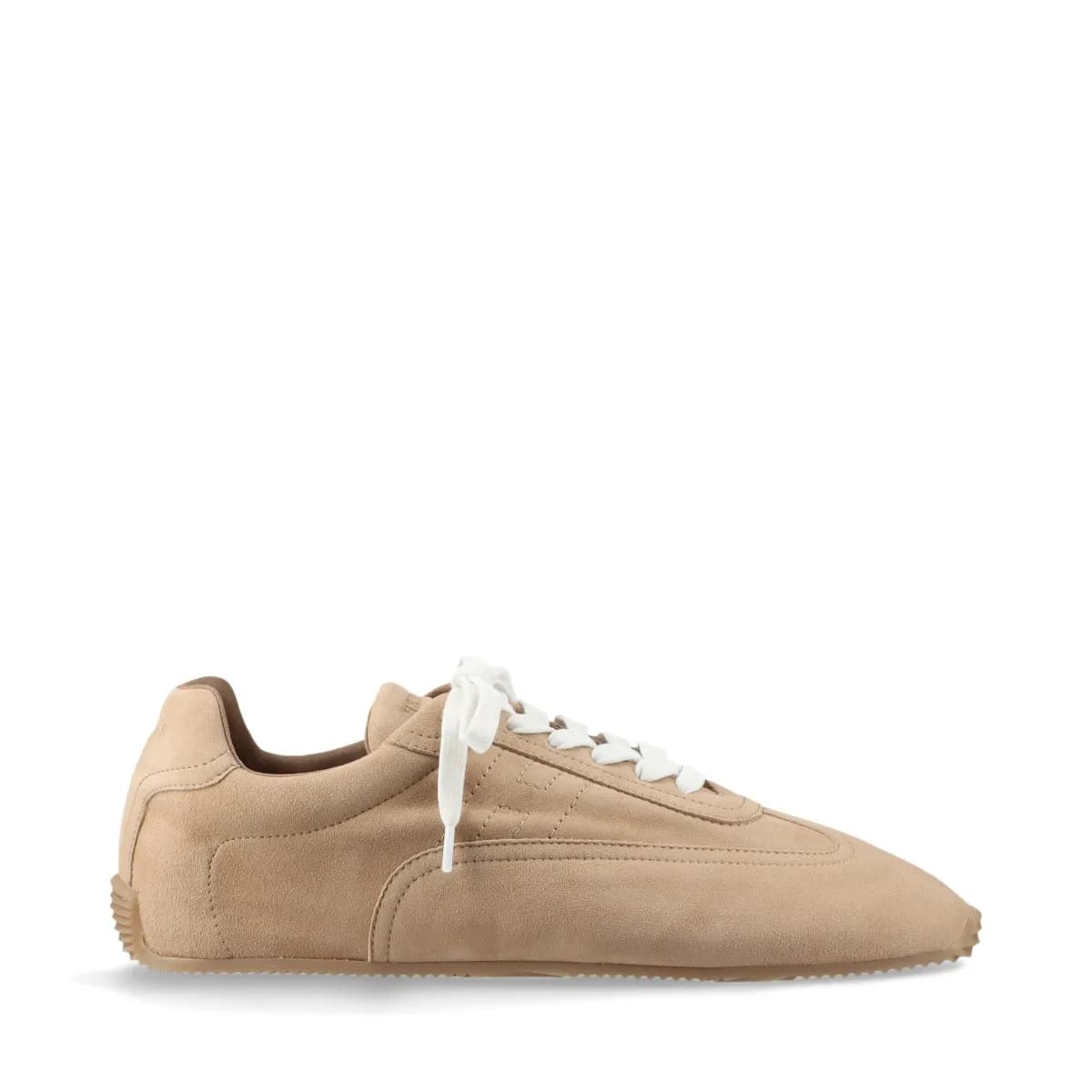 Beige suede low-top trainers with stitched logo detail on the side panel.